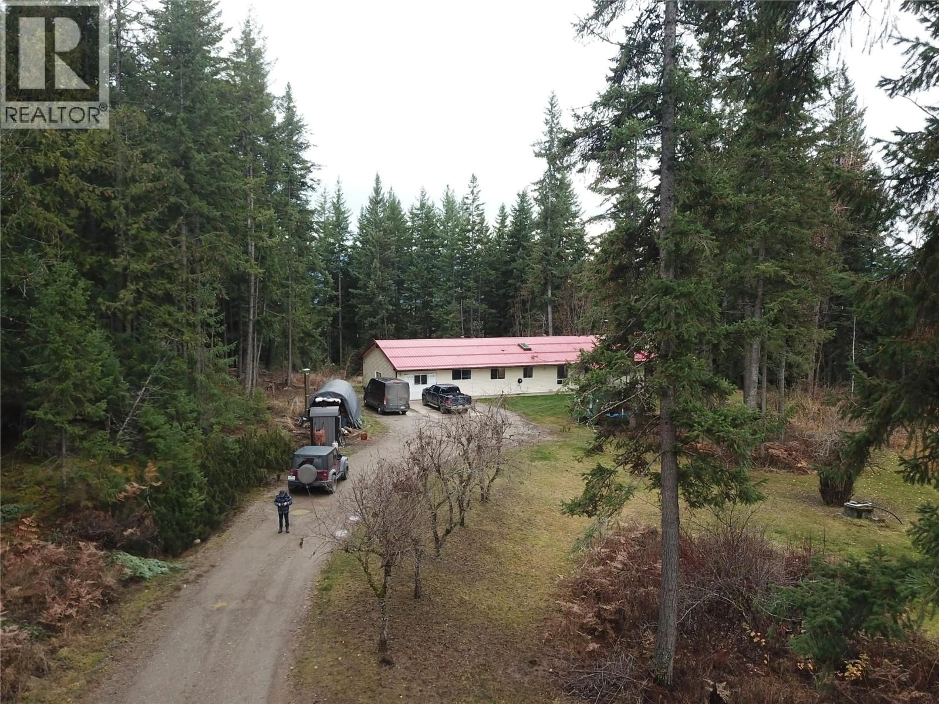 A pic from outside/outdoor area/front of a property/back of a property/a pic from drone, forest/trees view for 2550 CODY ROAD, Magna Bay British Columbia V0E1M7