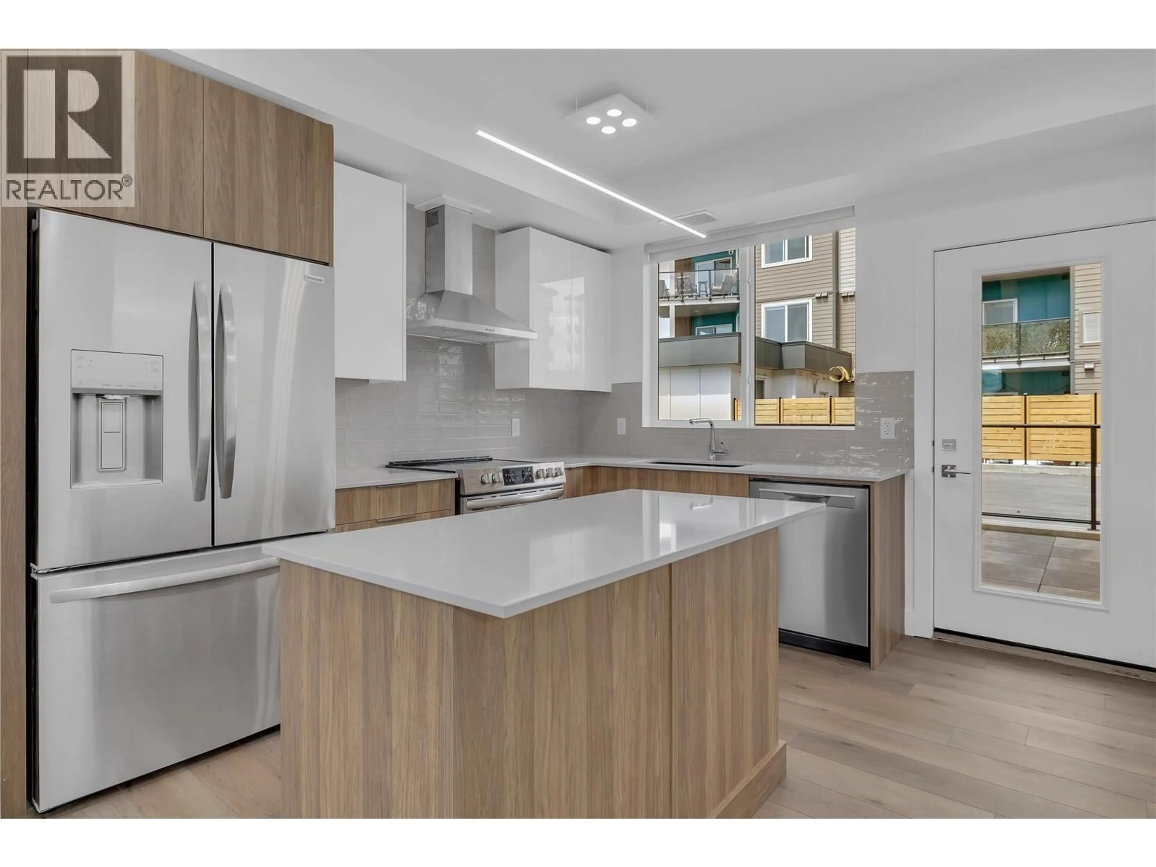 Open concept kitchen, unknown for 102C - 3642 MISSION SPRINGS DRIVE, Kelowna British Columbia V1W0E1