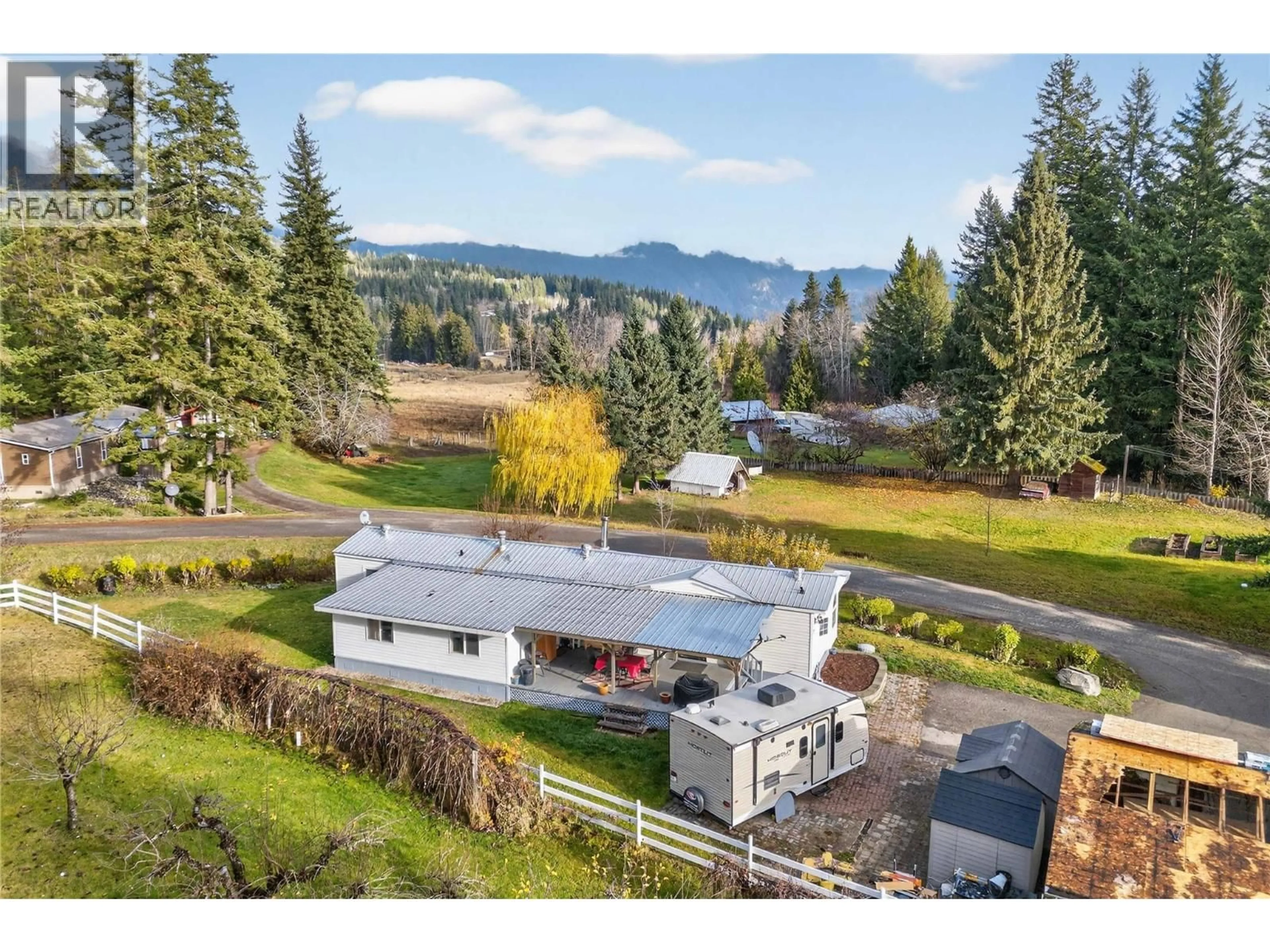 A pic from outside/outdoor area/front of a property/back of a property/a pic from drone, mountain view for 17 - 2036 SOLSQUA SICAMOUS ROAD, Sicamous British Columbia V0E2V4