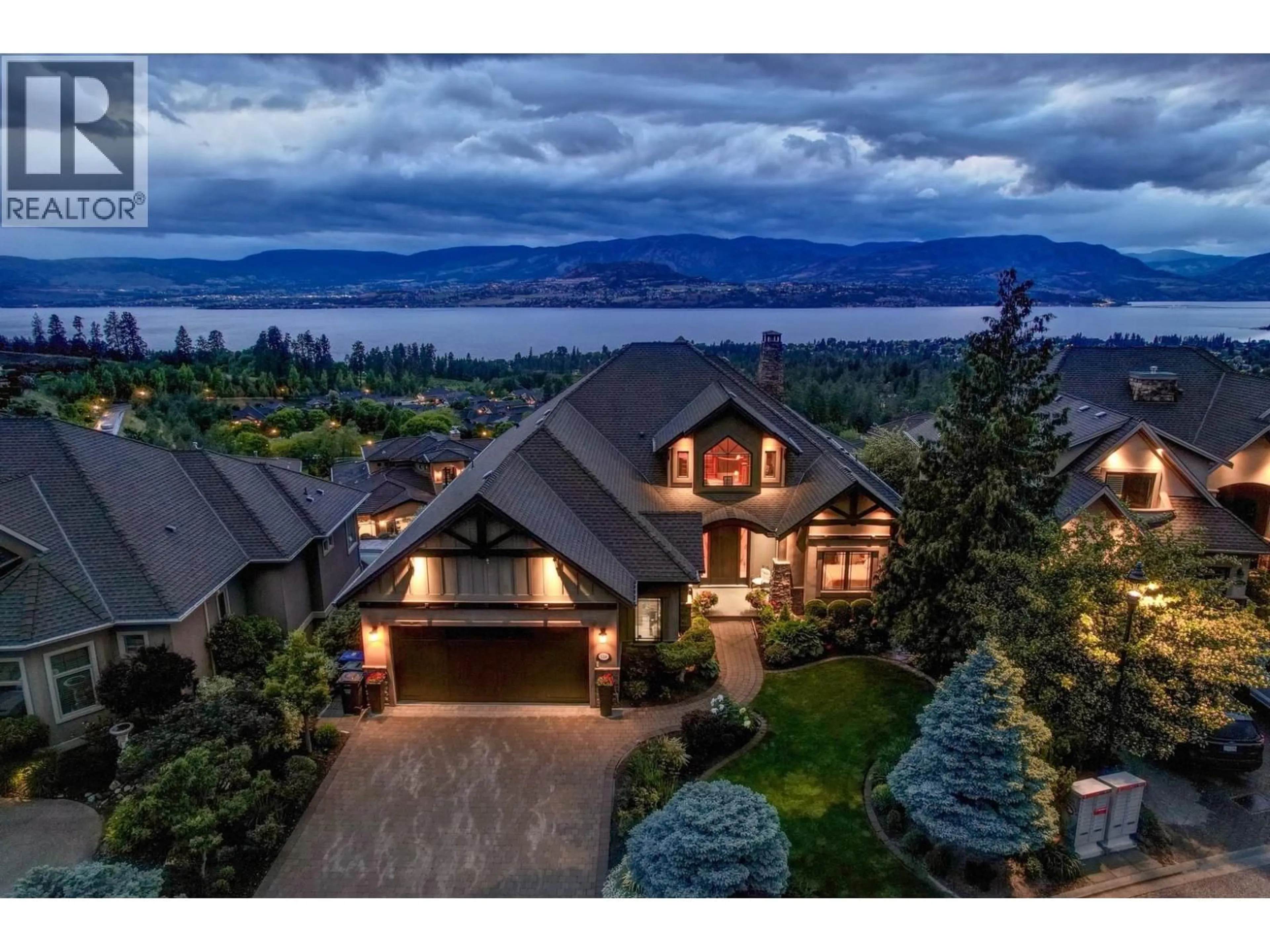 A pic from outside/outdoor area/front of a property/back of a property/a pic from drone, water/lake/river/ocean view for 734 MARIN CRESCENT, Kelowna British Columbia V1W5C8