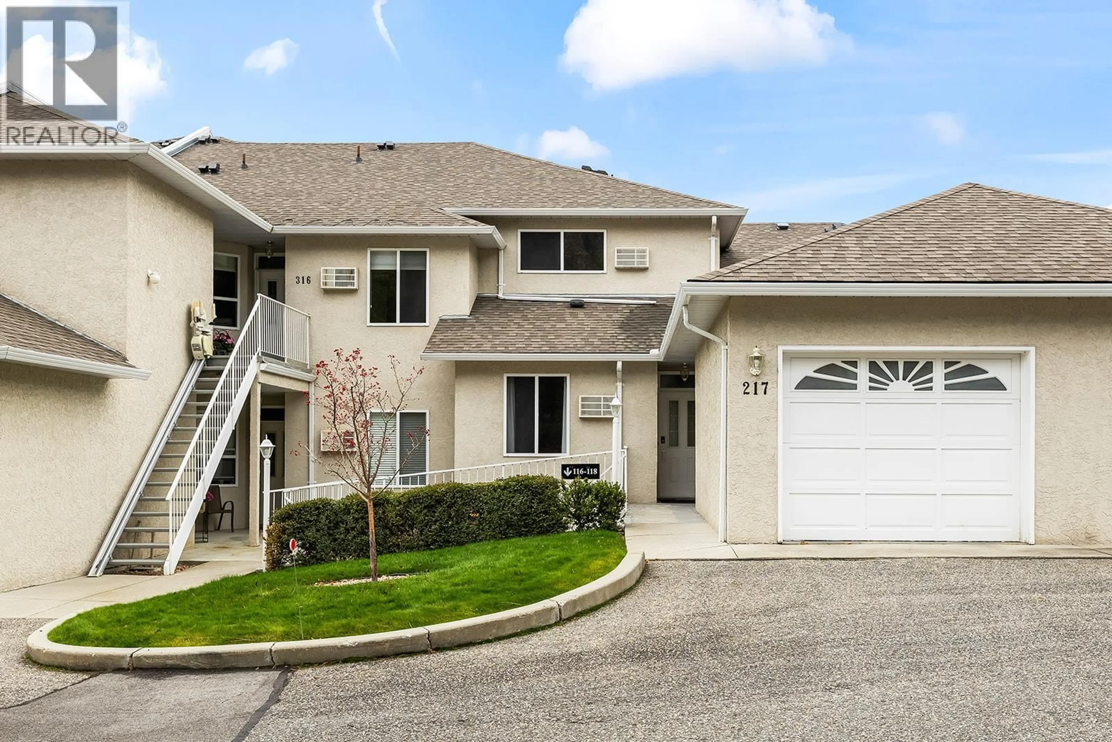 Home with vinyl exterior material, street for 217 - 2377 SHANNON WOODS DRIVE, West Kelowna British Columbia V4T2L8