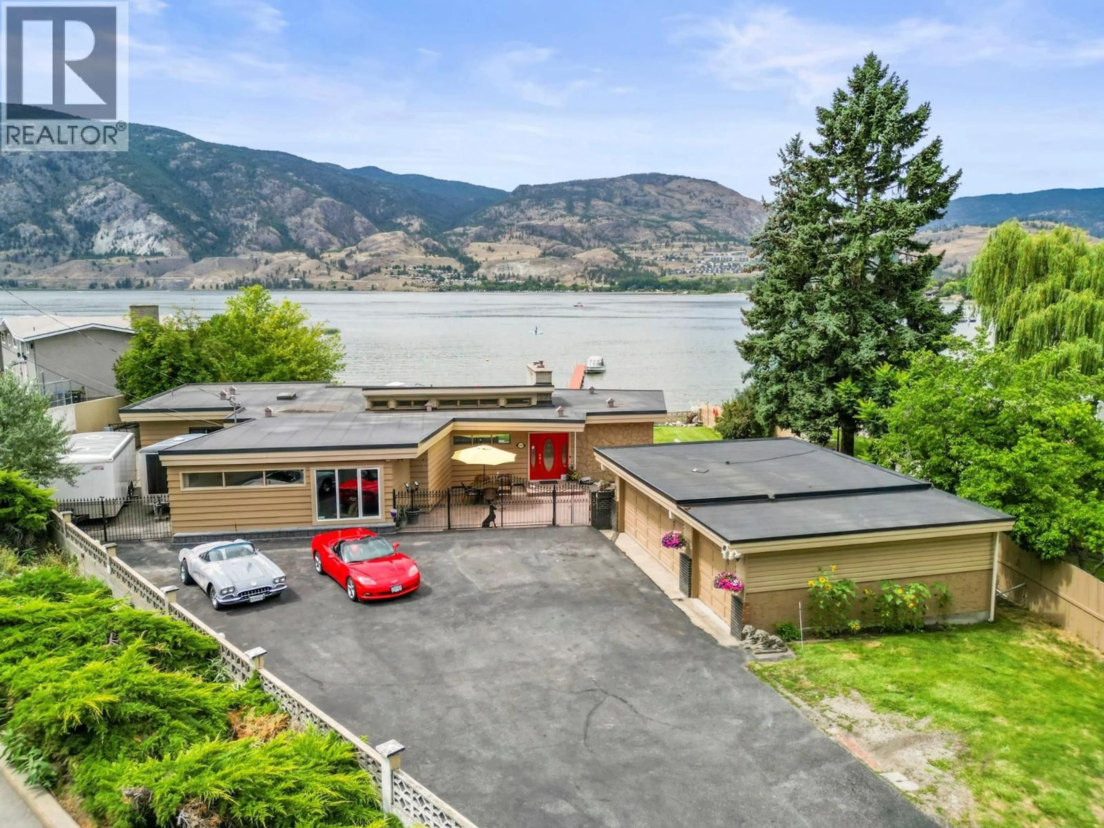 A pic from outside/outdoor area/front of a property/back of a property/a pic from drone, water/lake/river/ocean view for 3939 LAKESIDE ROAD, Penticton British Columbia V2A8W1