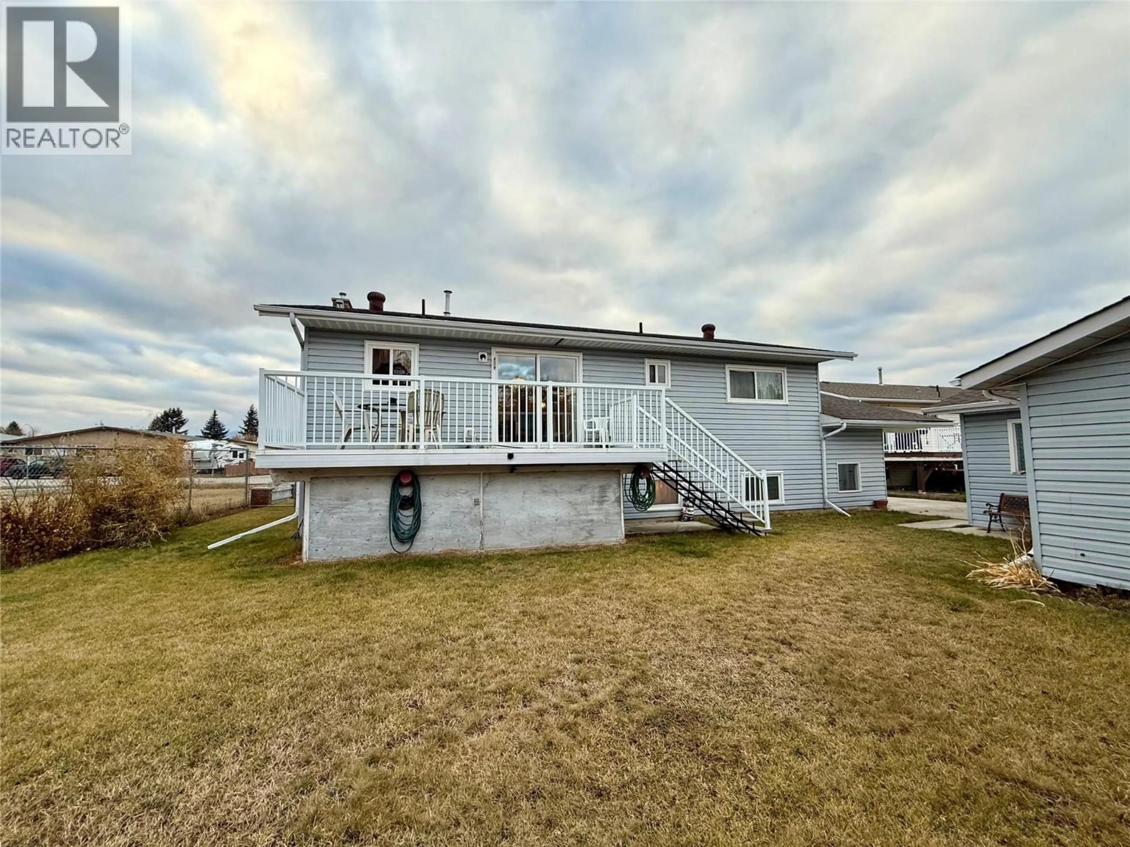 A pic from outside/outdoor area/front of a property/back of a property/a pic from drone, unknown for 800 24TH AVENUE NORTH, Cranbrook British Columbia V1C6G8