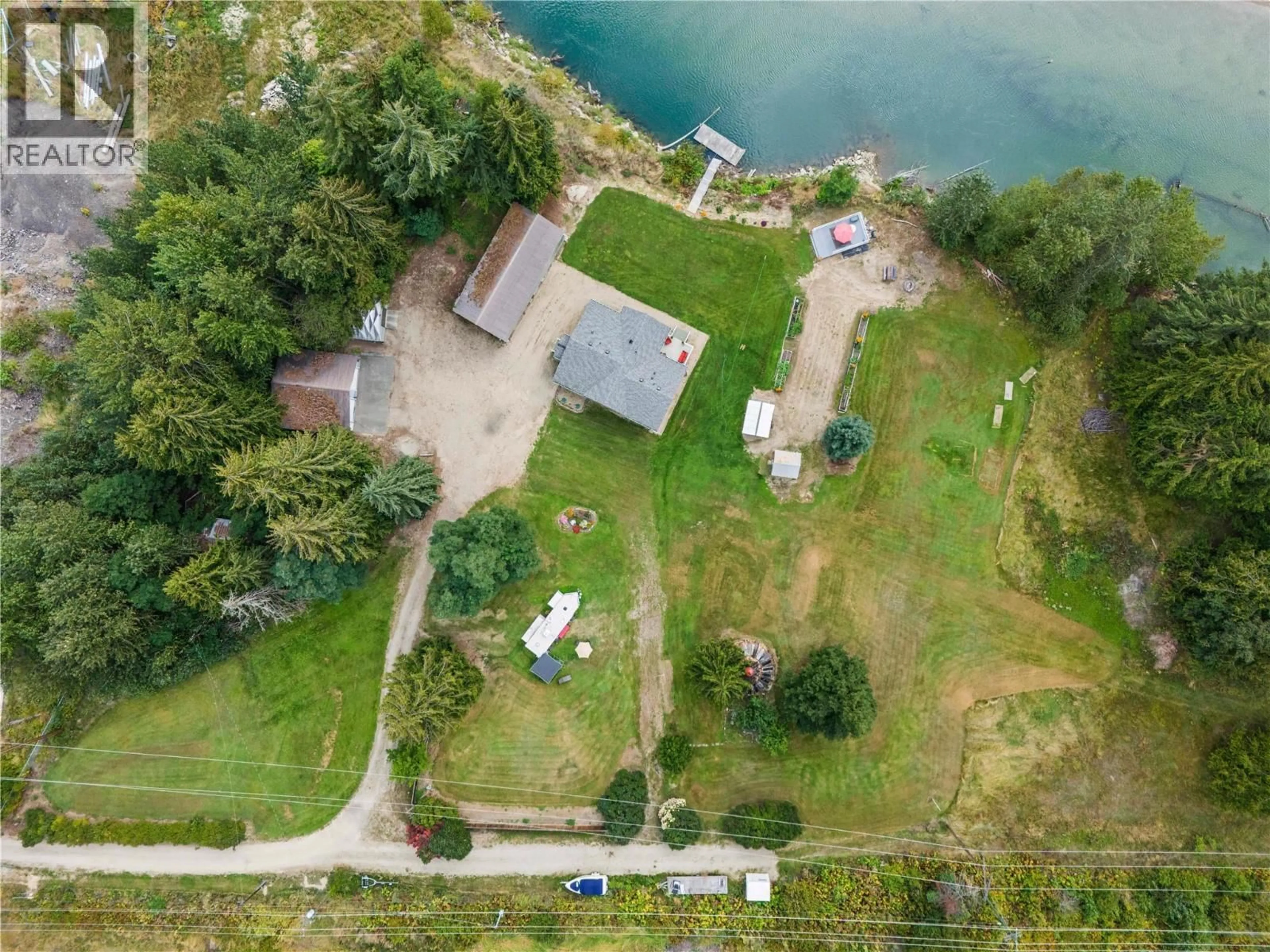 A pic from outside/outdoor area/front of a property/back of a property/a pic from drone, water/lake/river/ocean view for 421 HILLIER ROAD, Sicamous British Columbia V0E2V0