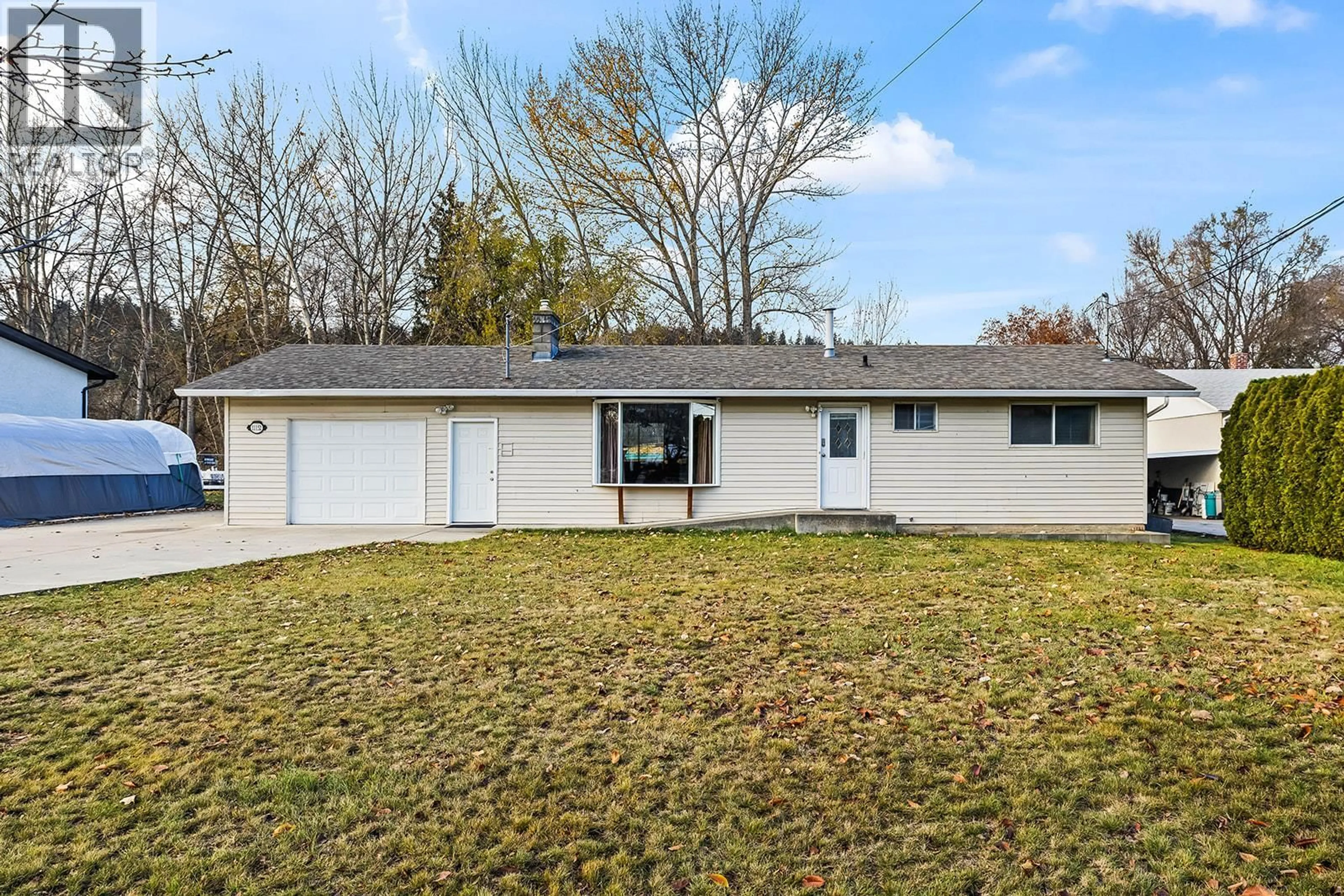 Home with vinyl exterior material, street for 11152 BOTTOM WOOD LAKE ROAD, Lake Country British Columbia V4V1V9