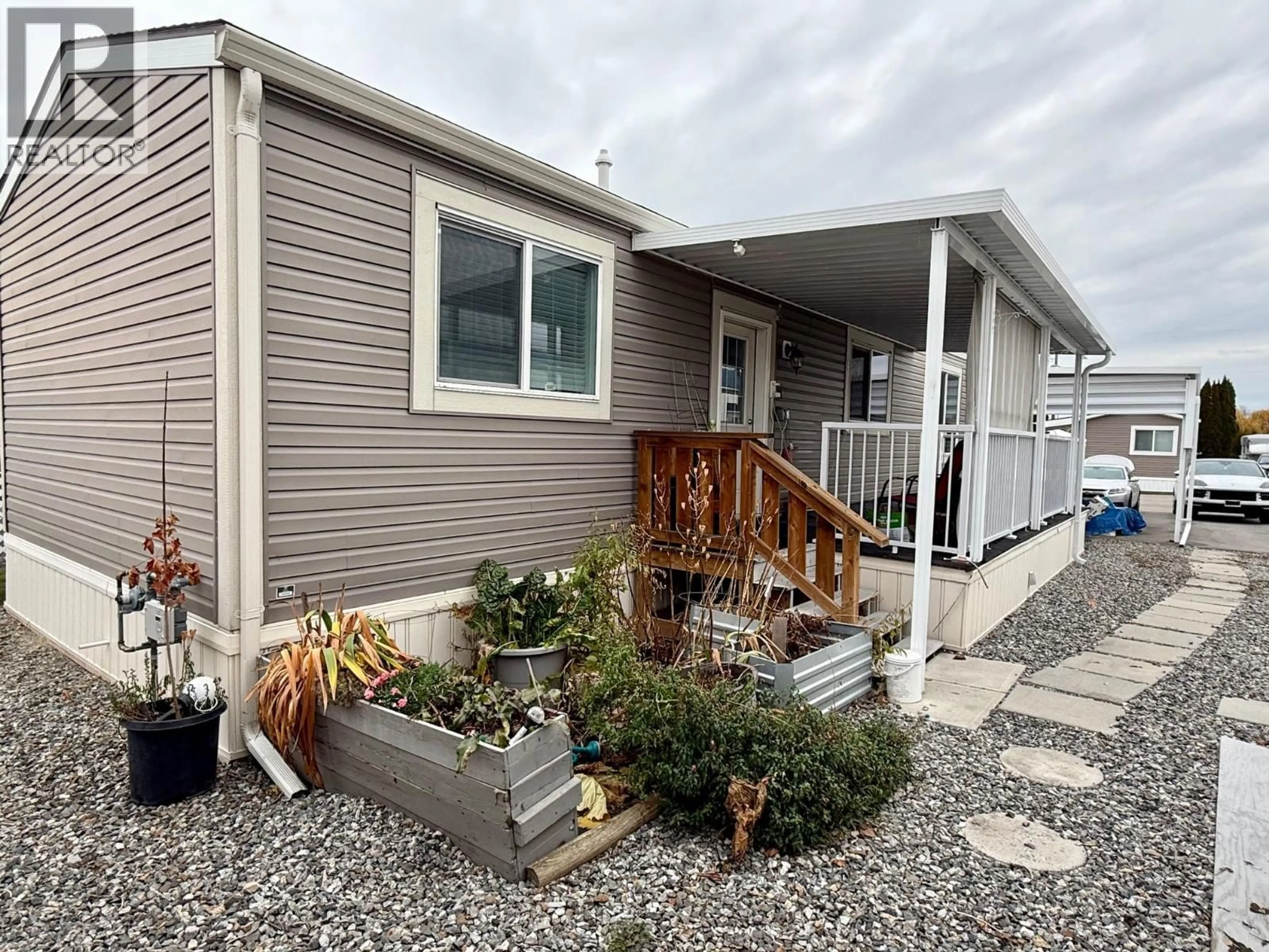 Home with vinyl exterior material, street for 205 - 3591 OLD VERNON ROAD, Kelowna British Columbia V1X6P4