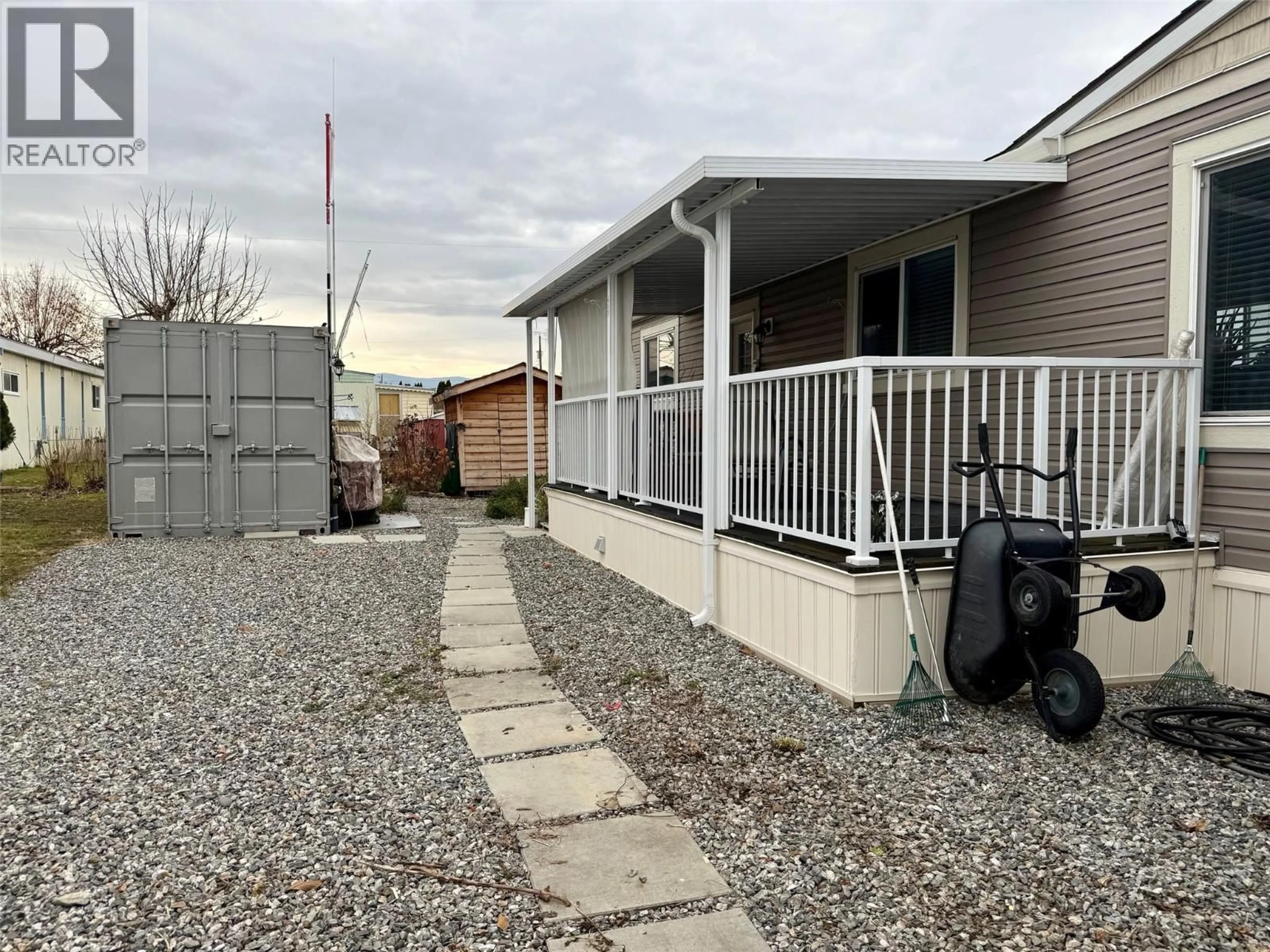 A pic from outside/outdoor area/front of a property/back of a property/a pic from drone, street for 205 - 3591 OLD VERNON ROAD, Kelowna British Columbia V1X6P4