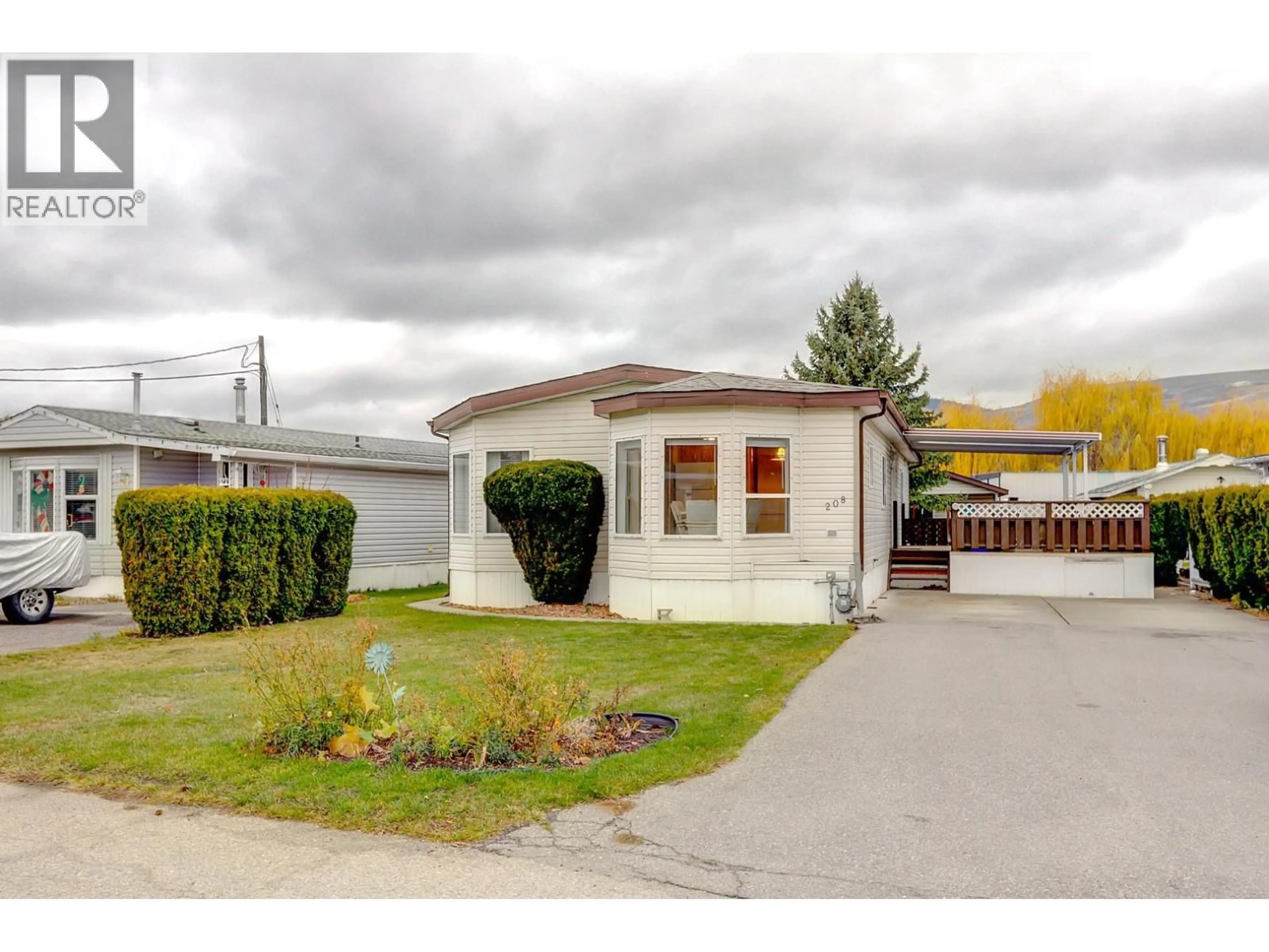 Home with vinyl exterior material, street for 208 - 6710 TRONSON ROAD, Vernon British Columbia V1H1X6