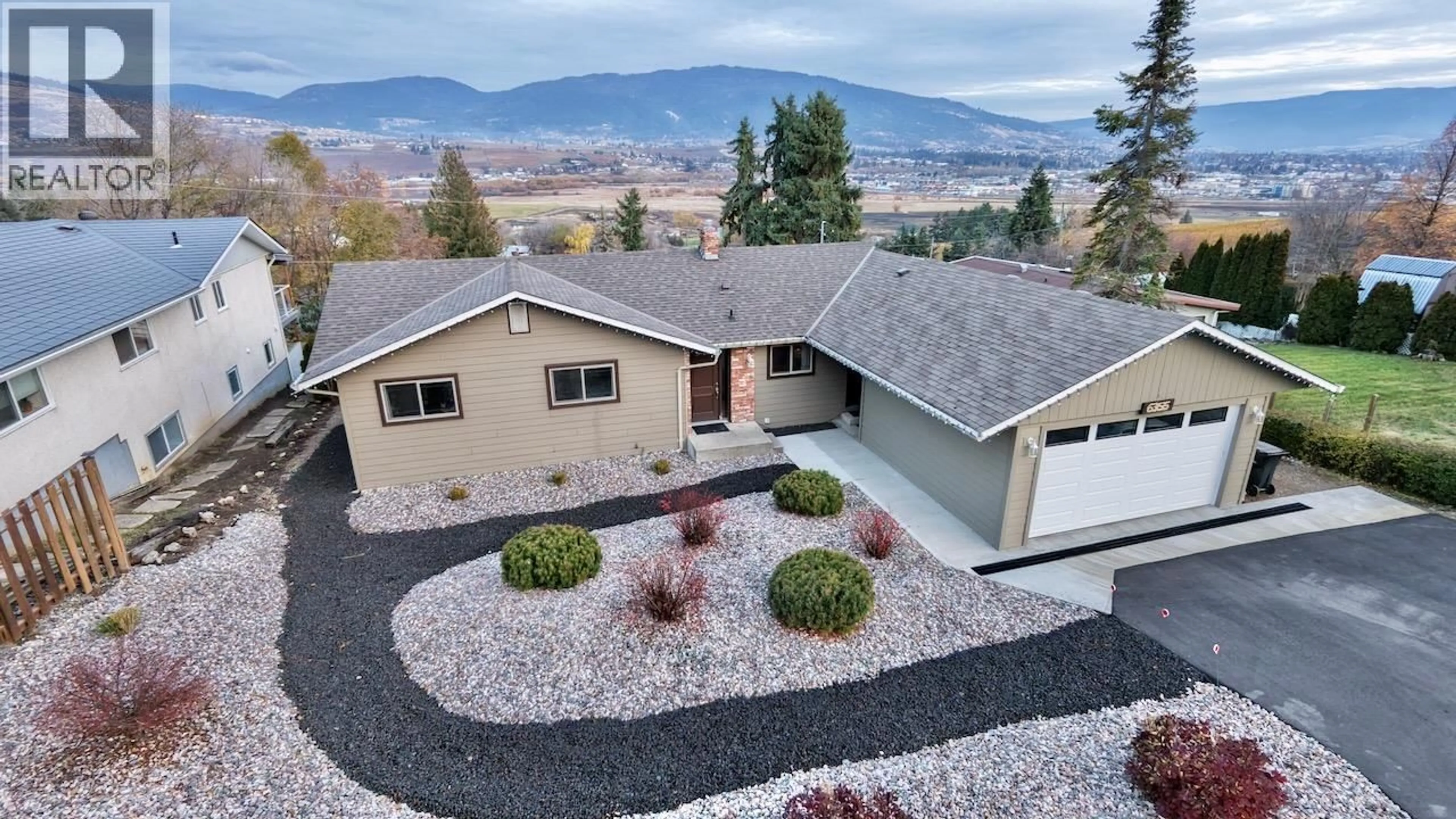 A pic from outside/outdoor area/front of a property/back of a property/a pic from drone, mountain view for 6355 CARDINAL ROAD, Vernon British Columbia V1H1W3