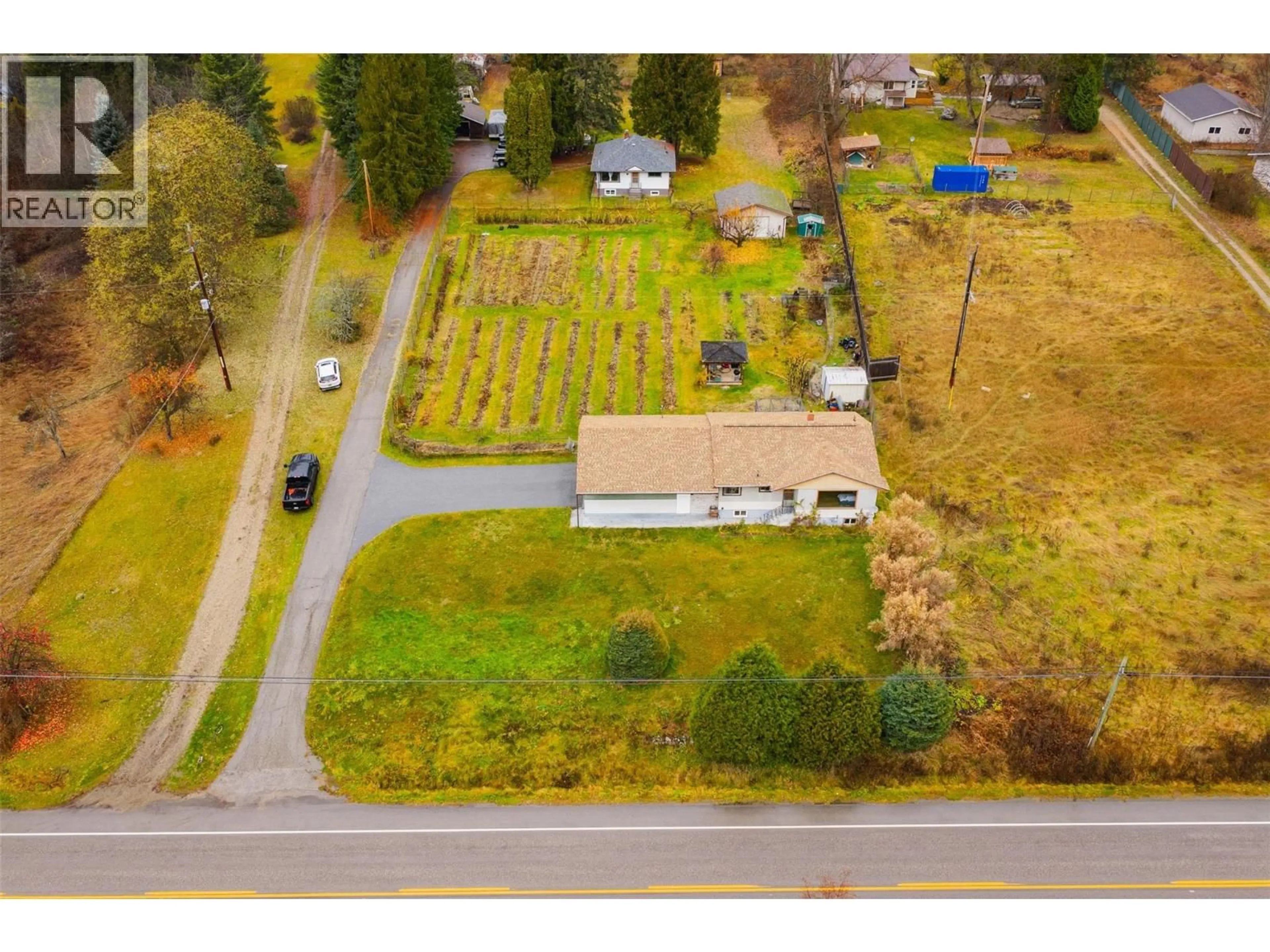 A pic from outside/outdoor area/front of a property/back of a property/a pic from drone, street for 1473 3A HIGHWAY, Castlegar British Columbia V1N4M7