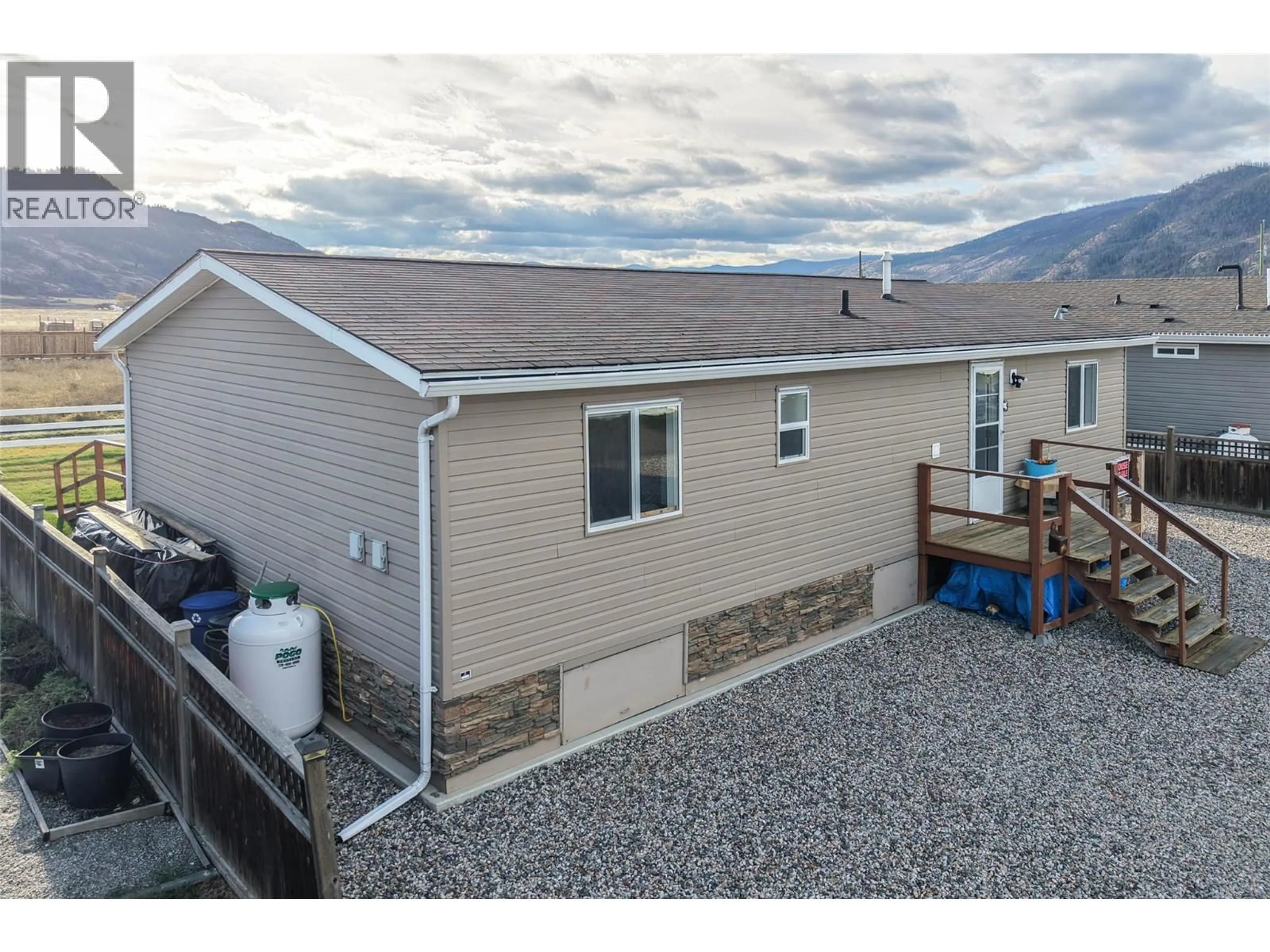 A pic from outside/outdoor area/front of a property/back of a property/a pic from drone, mountain view for 4 - 71 ANTOINE ROAD, Vernon British Columbia V1H2A3