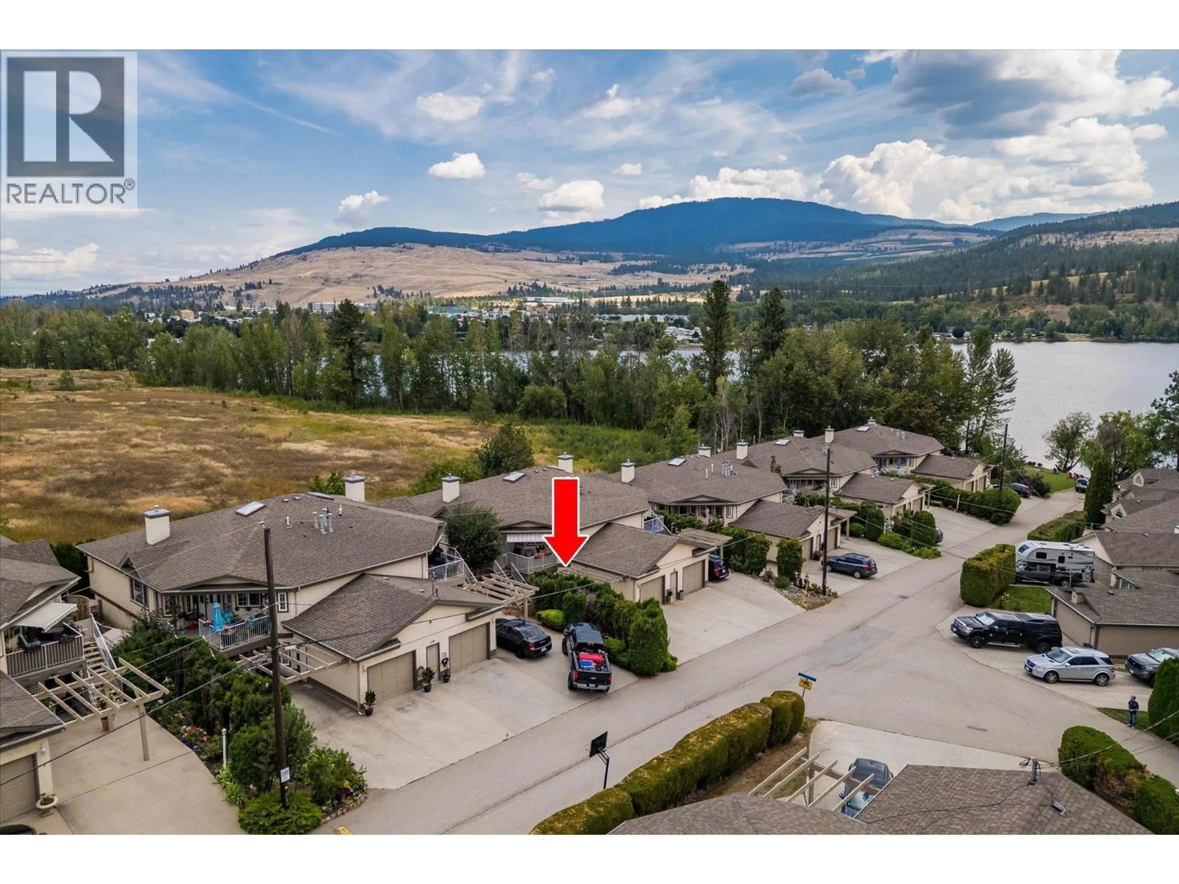 A pic from outside/outdoor area/front of a property/back of a property/a pic from drone, mountain view for 109-4 - 7841 HIGHWAY 97 N OTHER, Kelowna British Columbia V1V1E4