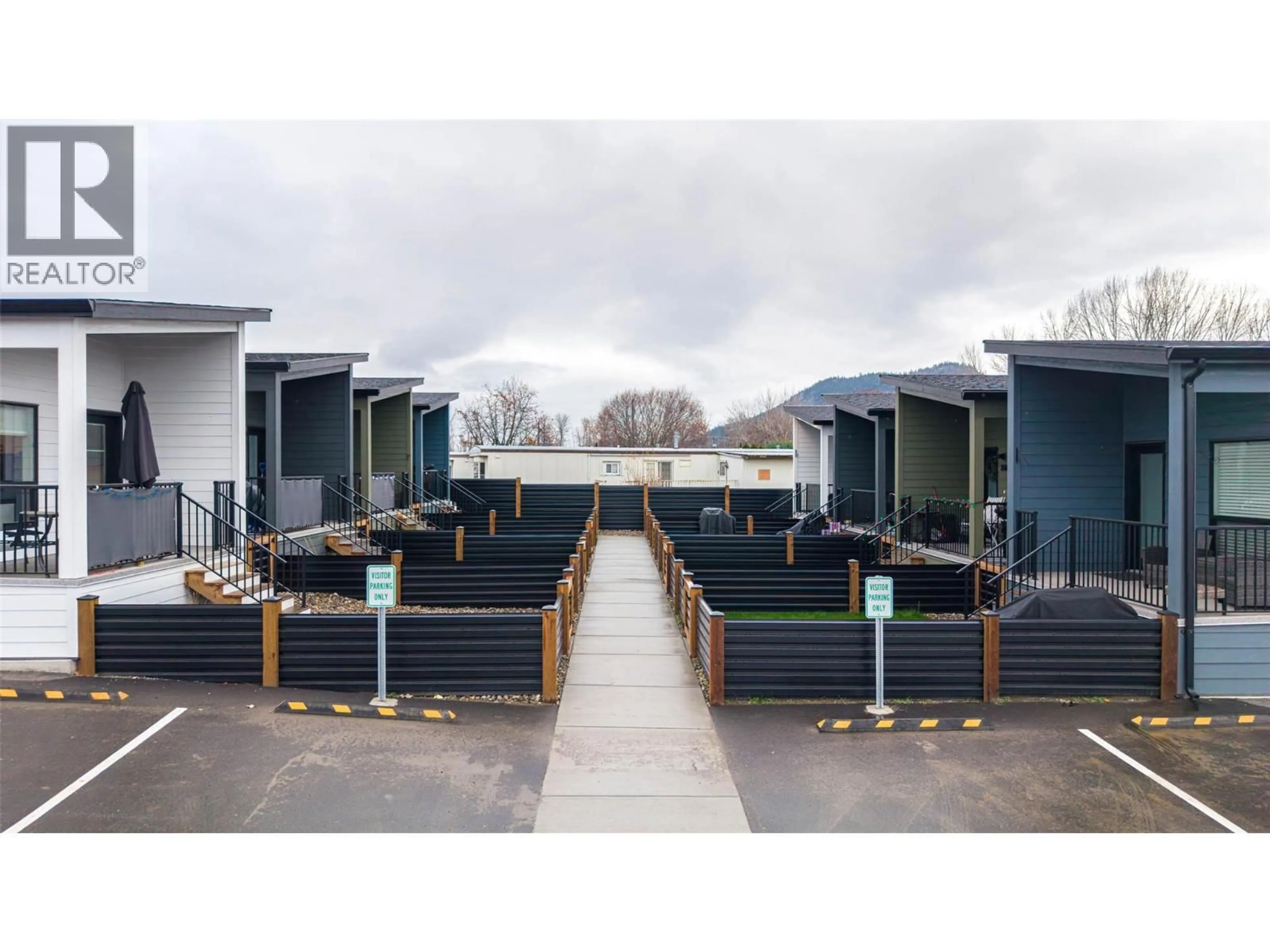 A pic from outside/outdoor area/front of a property/back of a property/a pic from drone, street for 206E - 8900 JIM BAILEY ROAD, Kelowna British Columbia V4V1E8