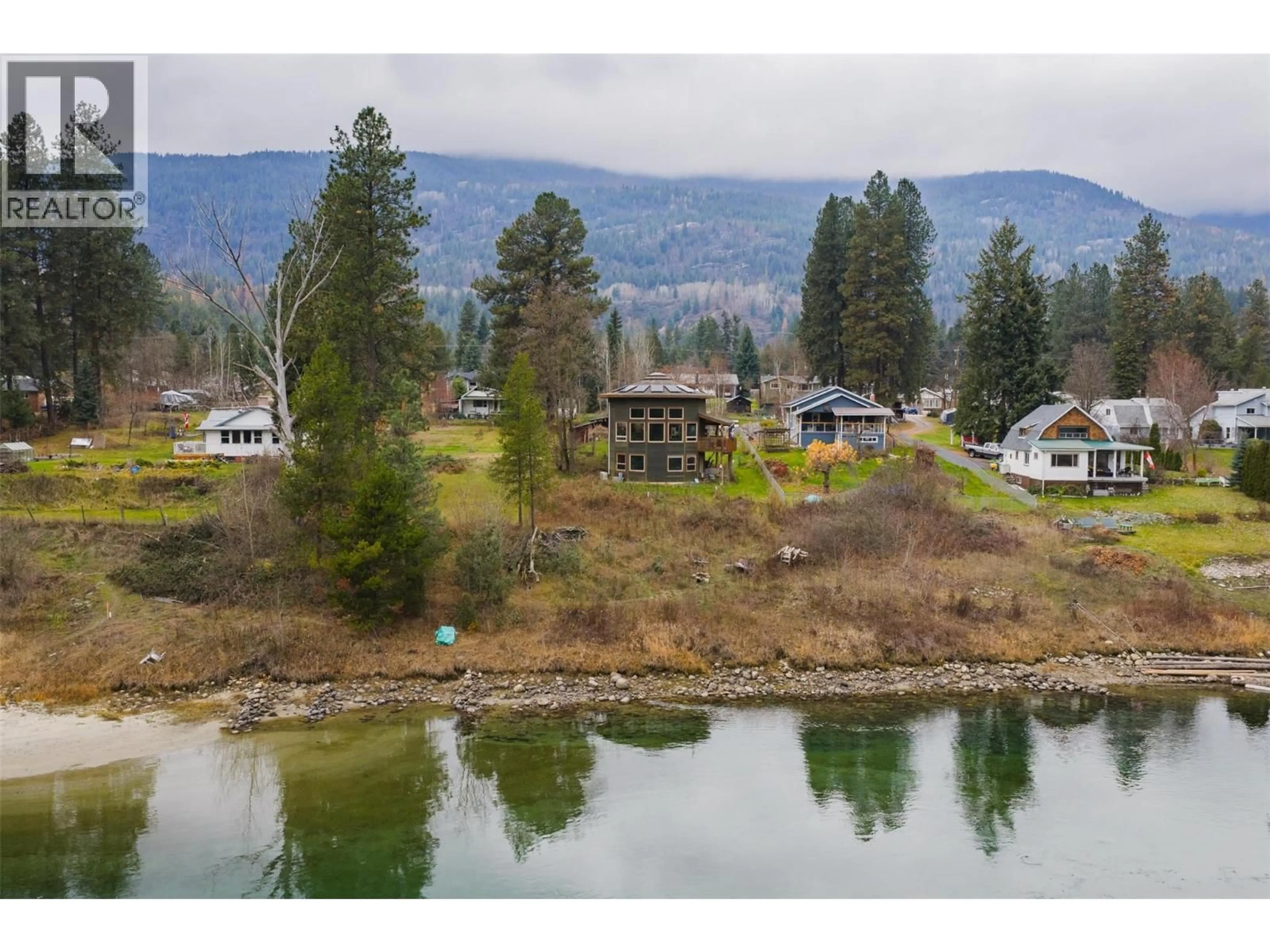 A pic from outside/outdoor area/front of a property/back of a property/a pic from drone, water/lake/river/ocean view for 810A 16TH AVENUE, Genelle British Columbia V0G1G0