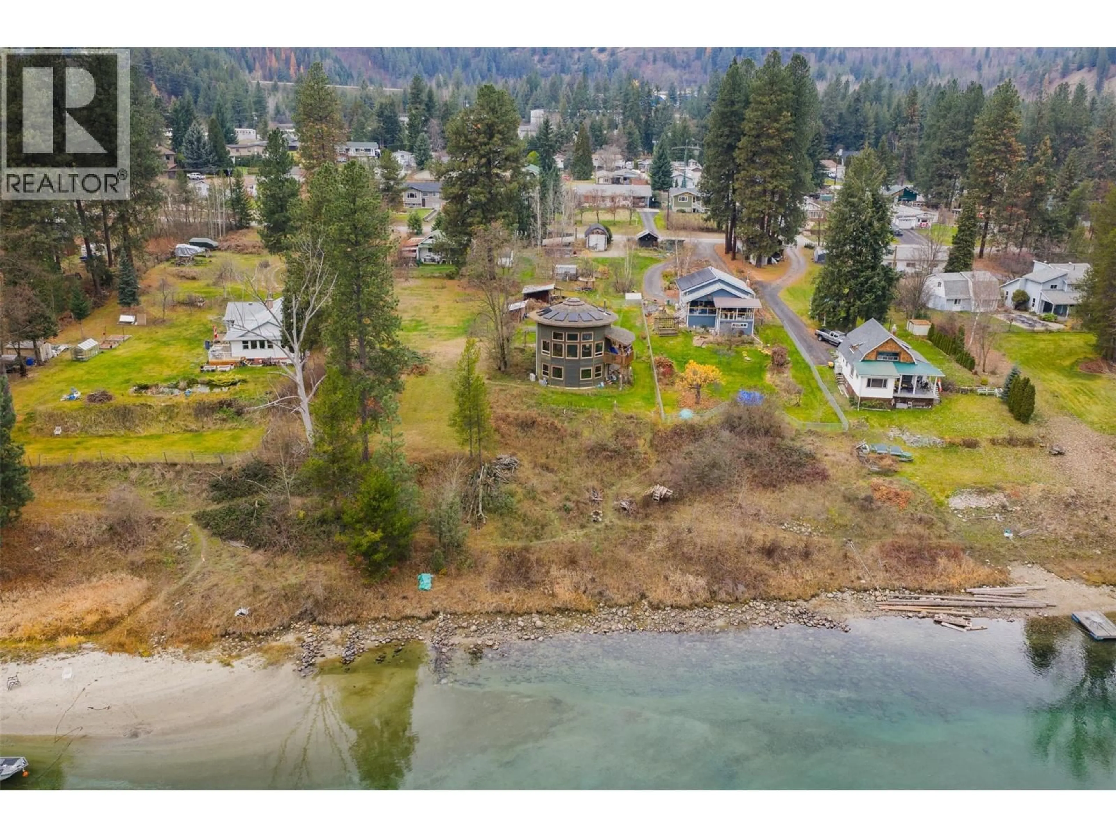 A pic from outside/outdoor area/front of a property/back of a property/a pic from drone, water/lake/river/ocean view for 810A 16TH AVENUE, Genelle British Columbia V0G1G0
