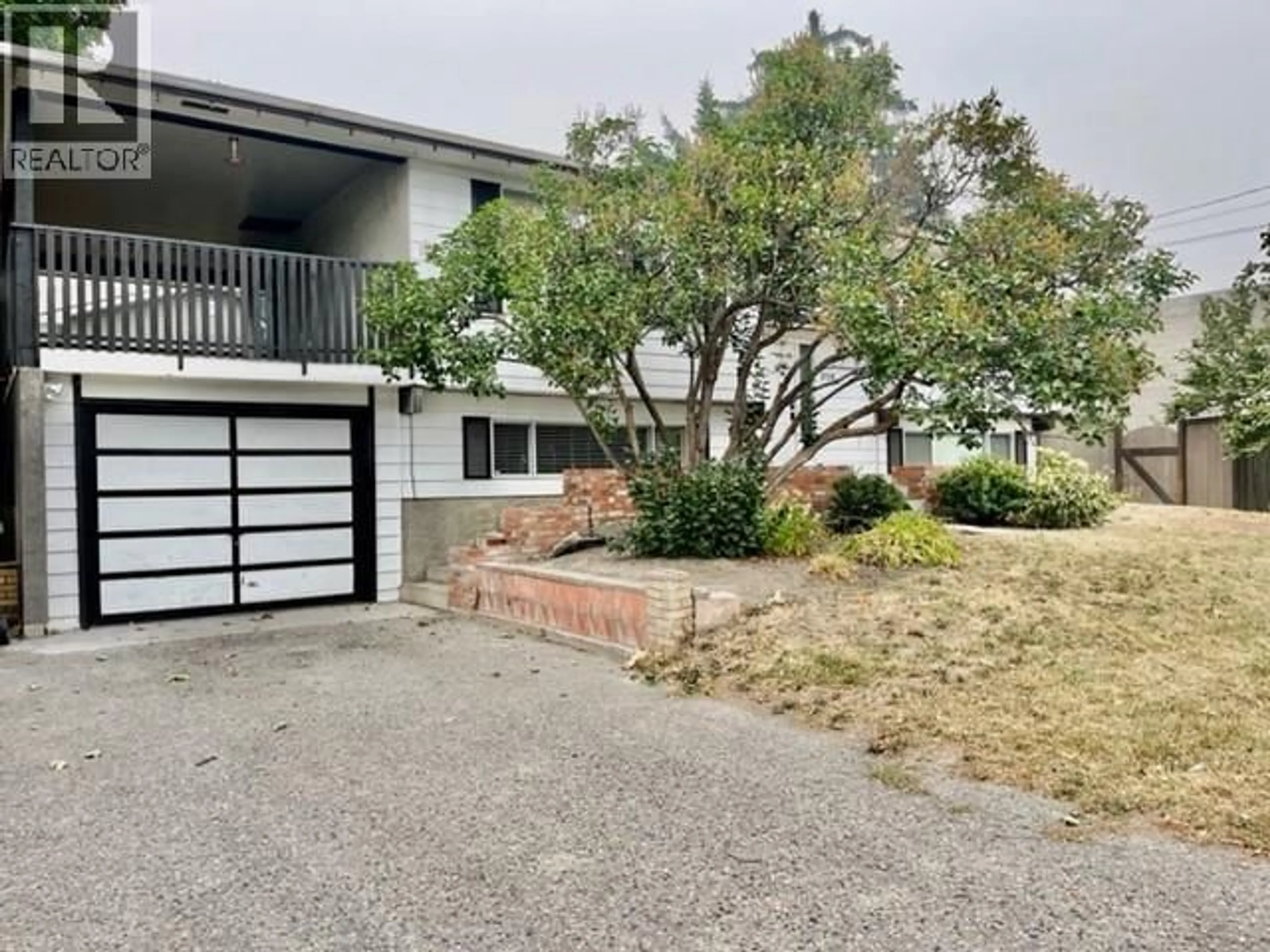 A pic from outside/outdoor area/front of a property/back of a property/a pic from drone, street for 3720 HOSKINS ROAD, West Kelowna British Columbia V4T1K7