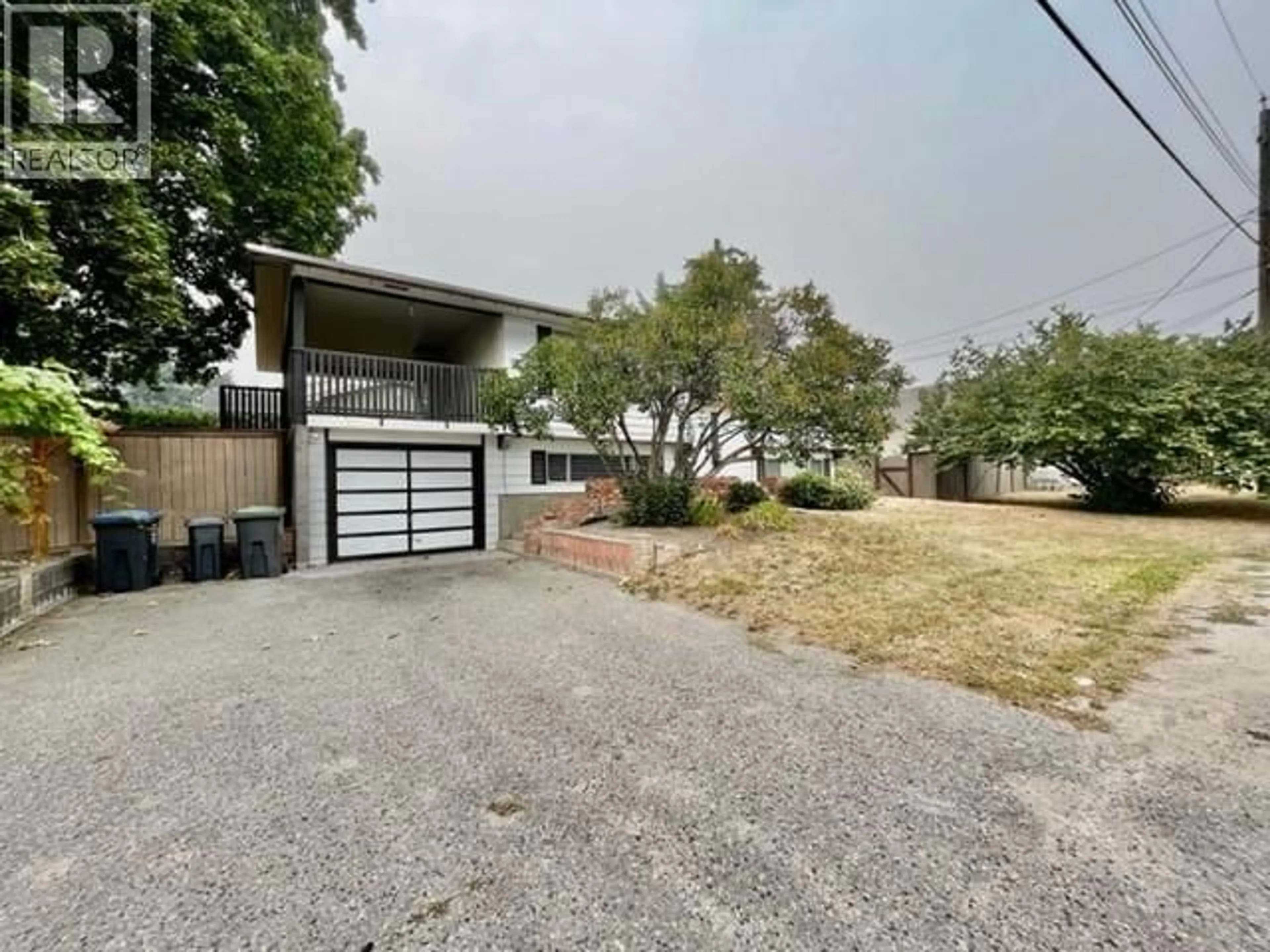 A pic from outside/outdoor area/front of a property/back of a property/a pic from drone, street for 3720 HOSKINS ROAD, West Kelowna British Columbia V4T1K7
