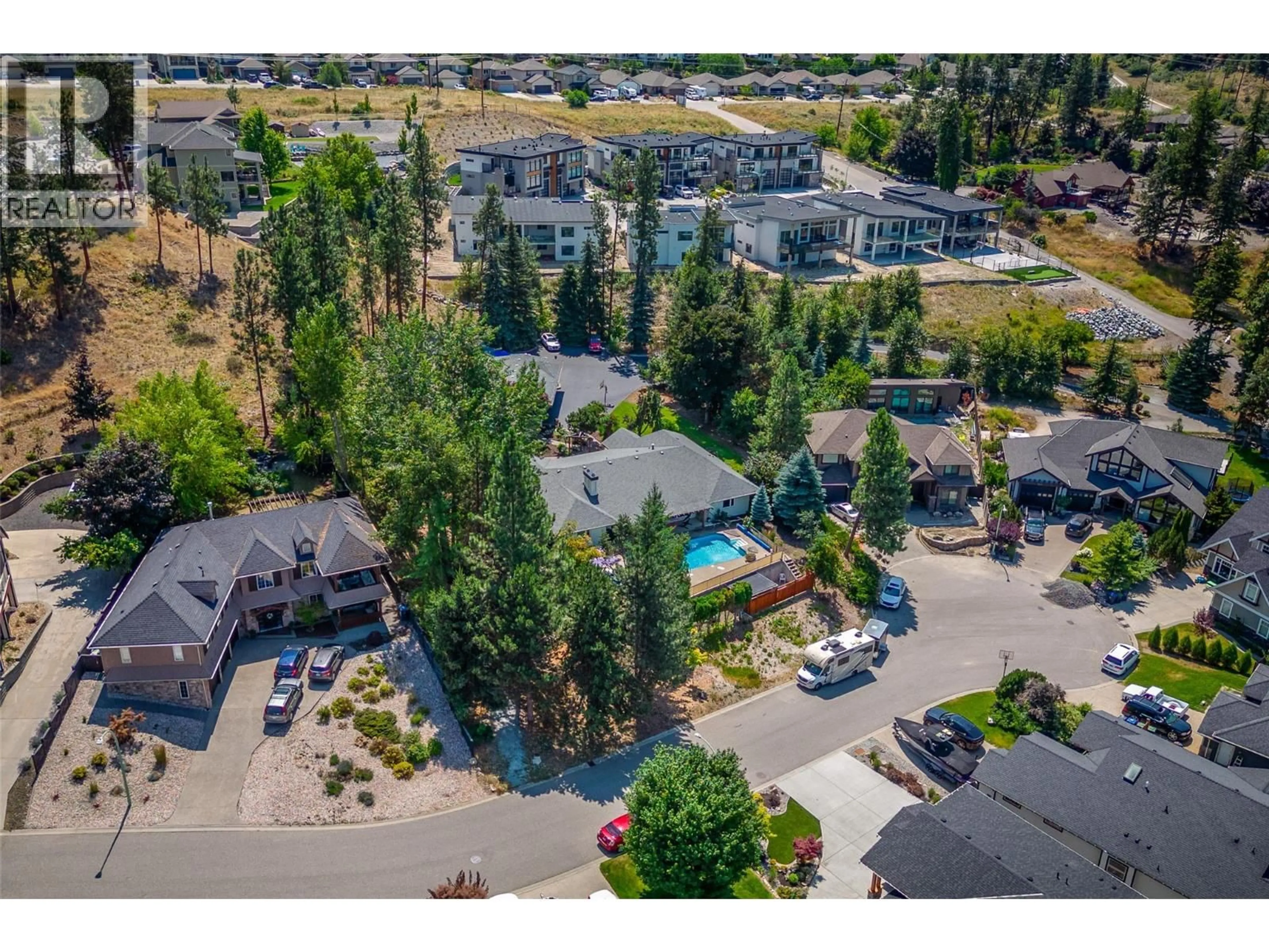 A pic from outside/outdoor area/front of a property/back of a property/a pic from drone, mountain view for 514 HAWES COURT, Kelowna British Columbia V1W4A7