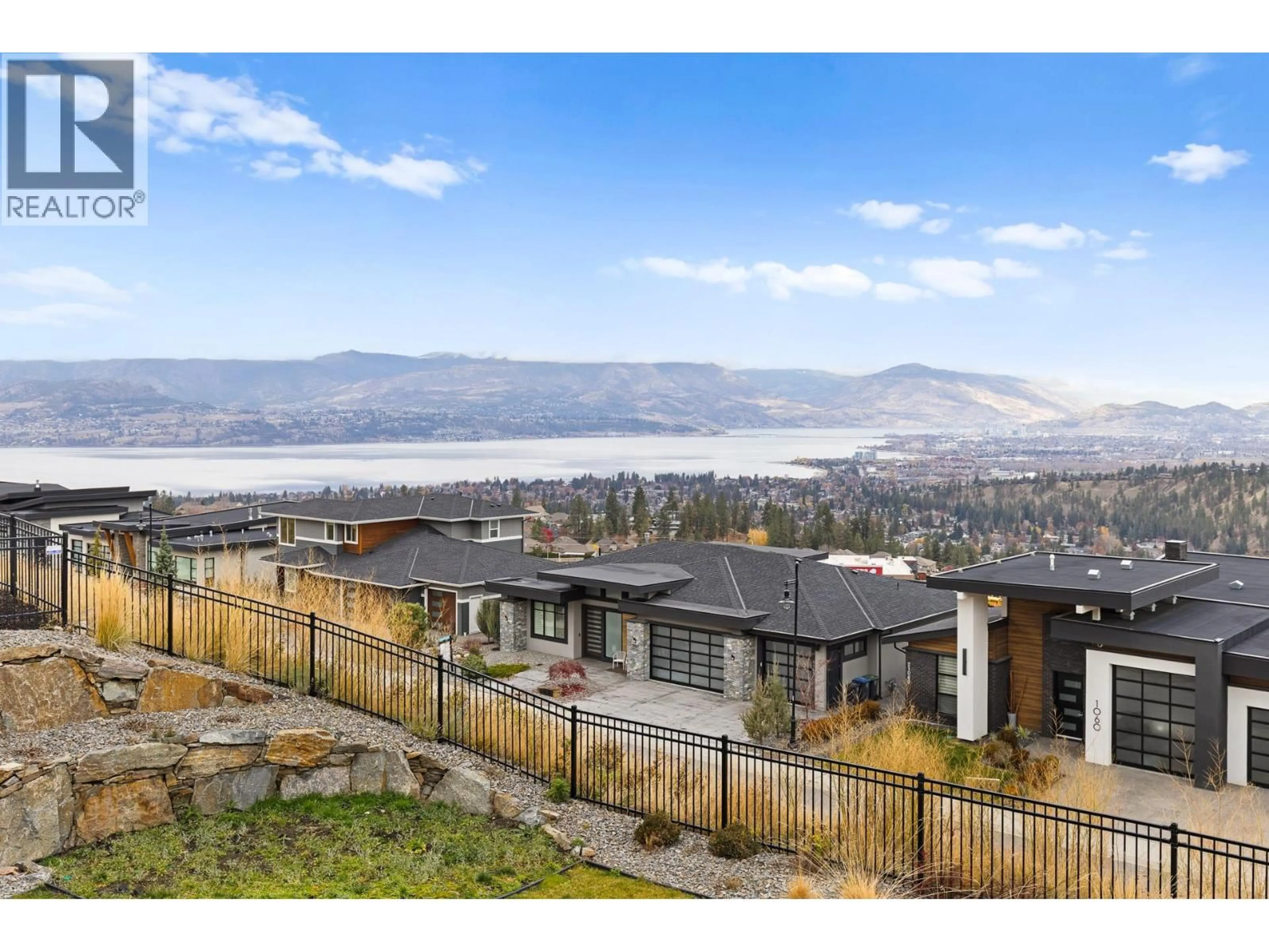 A pic from outside/outdoor area/front of a property/back of a property/a pic from drone, mountain view for 1068 CLARANCE AVENUE, Kelowna British Columbia V1W5M6