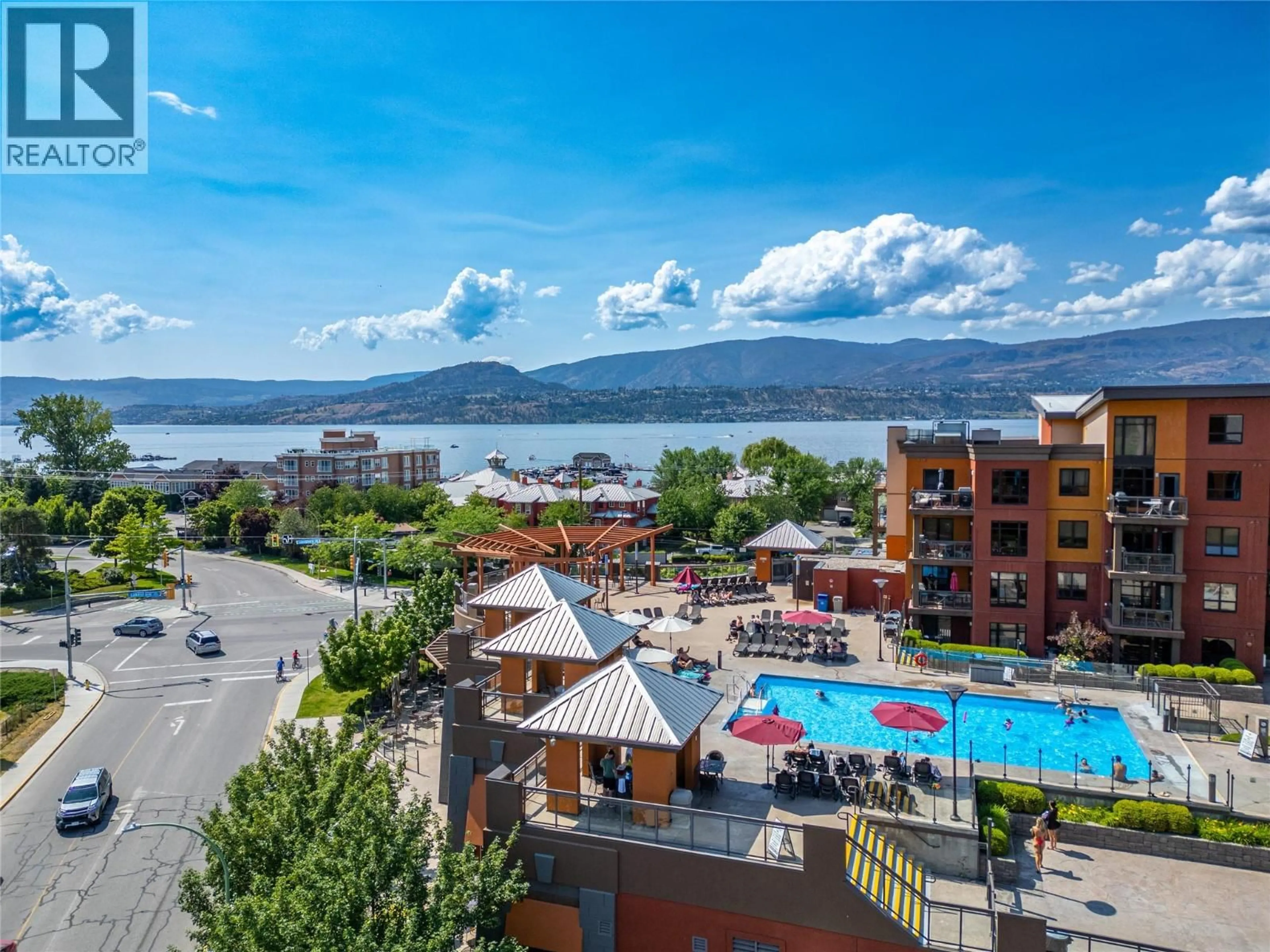 A pic from outside/outdoor area/front of a property/back of a property/a pic from drone, water/lake/river/ocean view for 629 - 654 COOK ROAD, Kelowna British Columbia V1W3G7
