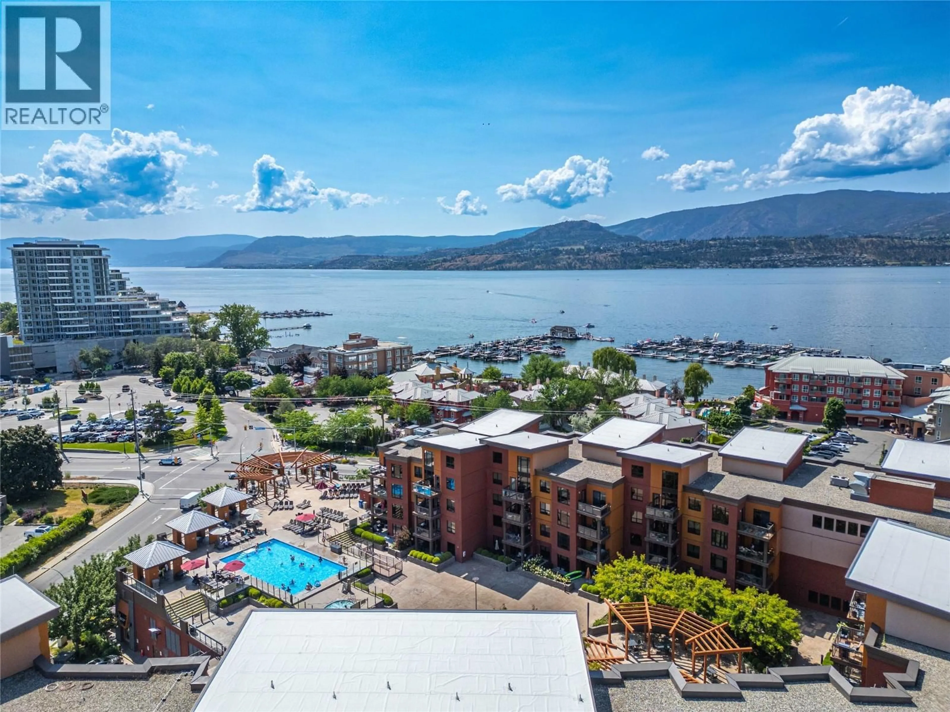 A pic from outside/outdoor area/front of a property/back of a property/a pic from drone, water/lake/river/ocean view for 629 - 654 COOK ROAD, Kelowna British Columbia V1W3G7