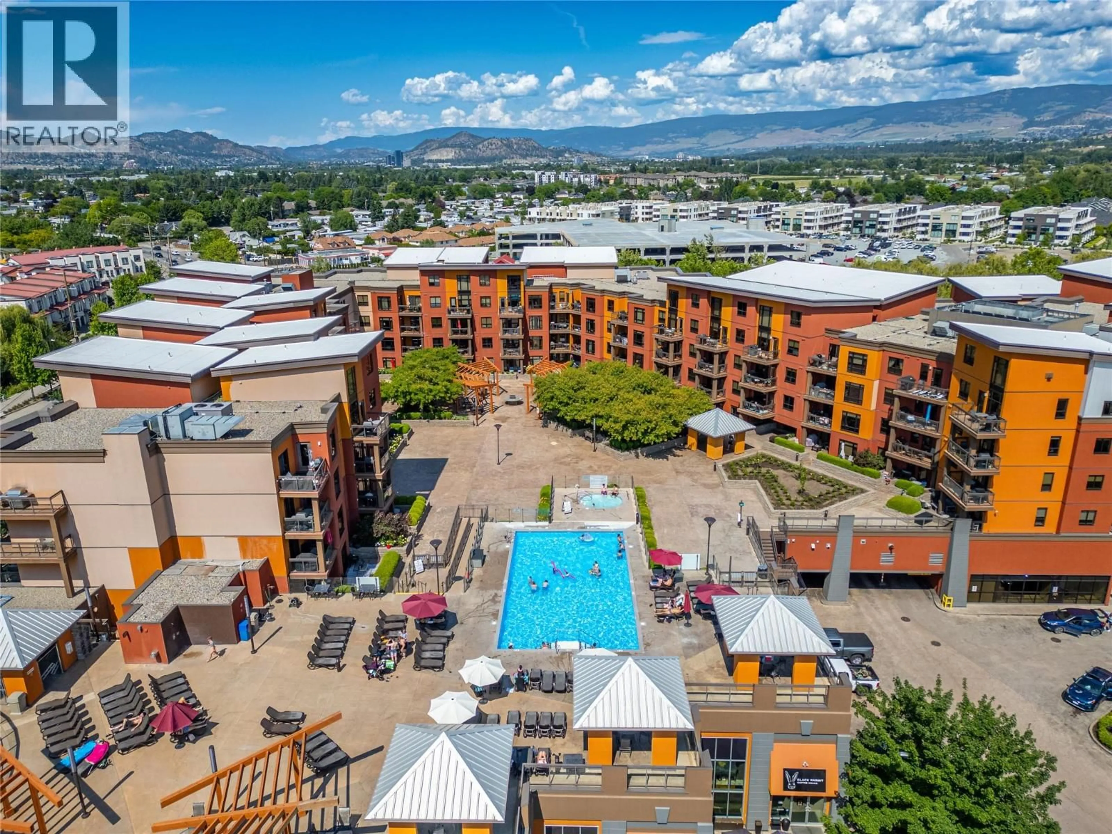 A pic from outside/outdoor area/front of a property/back of a property/a pic from drone, mountain view for 629 - 654 COOK ROAD, Kelowna British Columbia V1W3G7