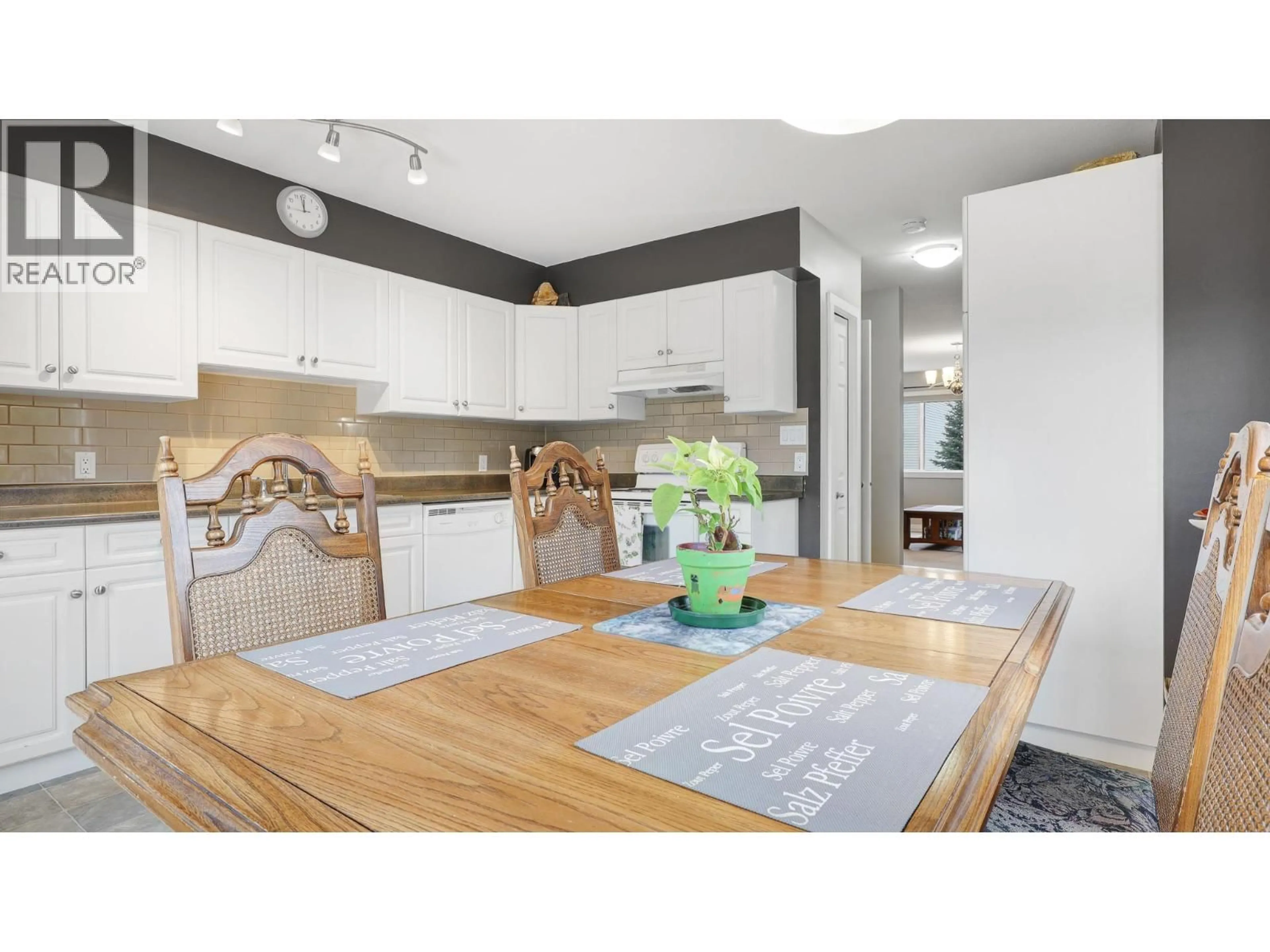 Open concept kitchen, wood/laminate floor for 501 - 200 BLACK FOREST TRAIL, Invermere British Columbia V0A1K2