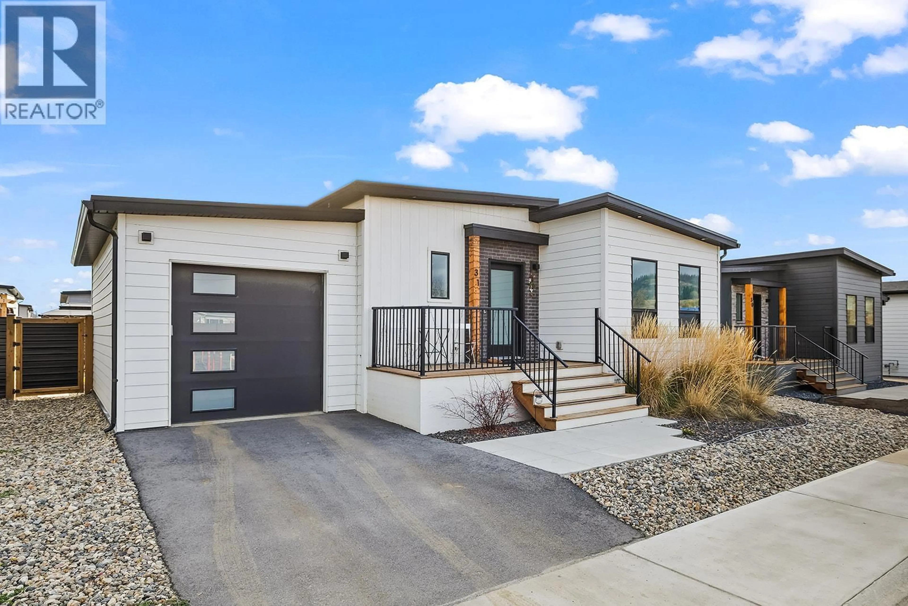 Home with brick exterior material, street for 31 - 8900 JIM BAILEY ROAD, Kelowna British Columbia V4V0B5