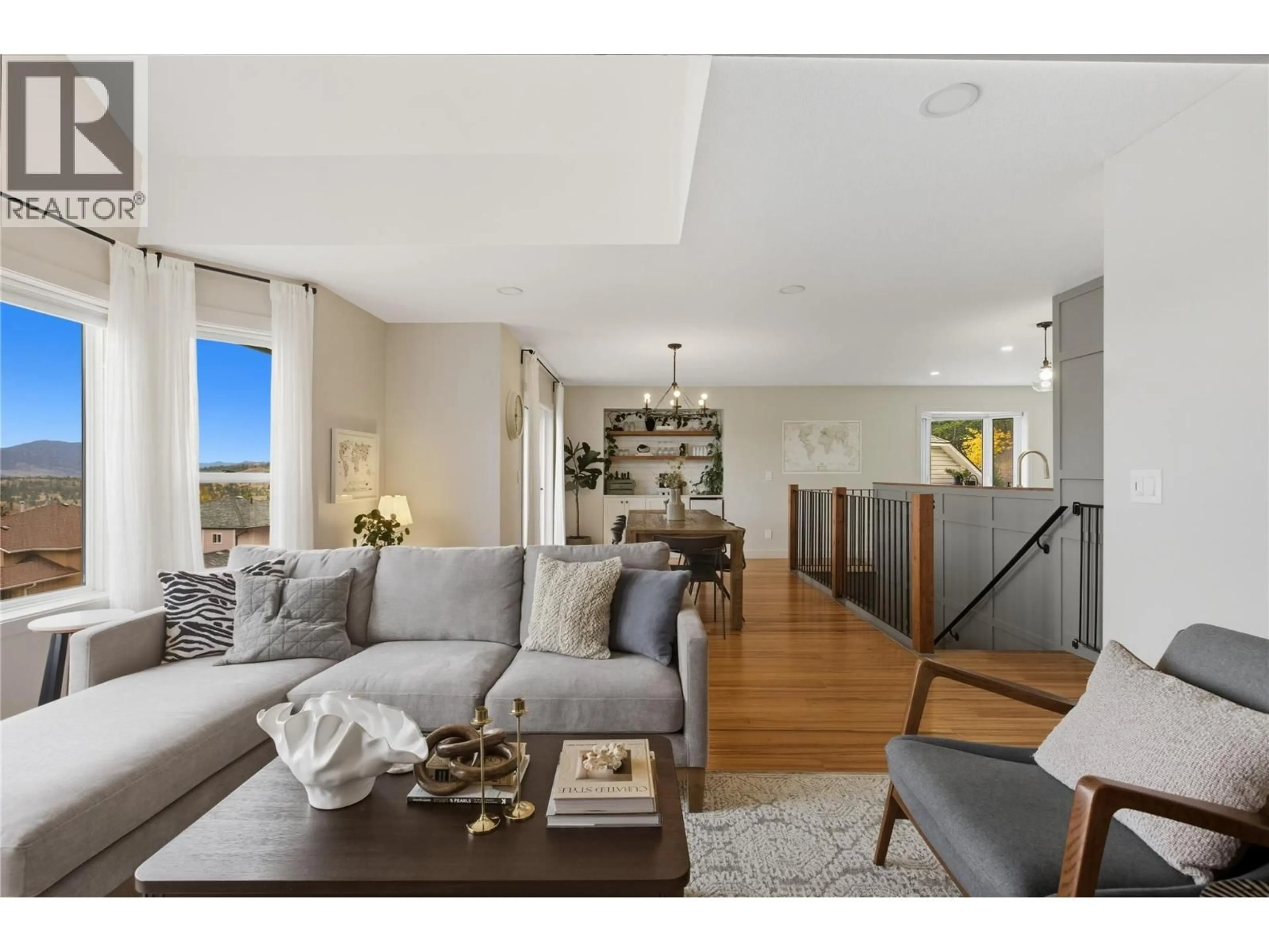 Living room with furniture, wood/laminate floor for 2439 DRUMMOND COURT, Kamloops British Columbia V1S1T9