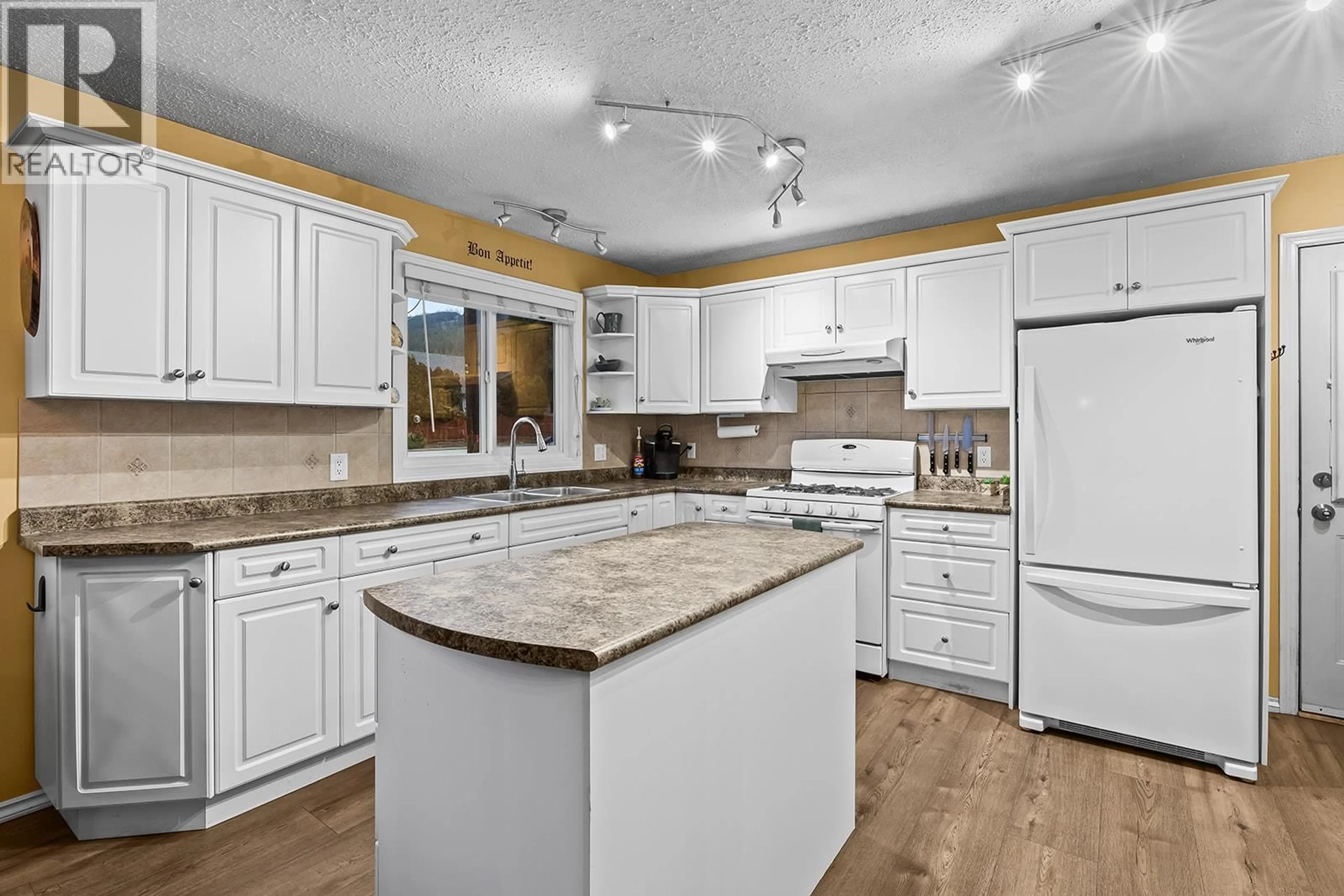 Open concept kitchen, ceramic/tile floor for 3345 GATES ROAD, West Kelowna British Columbia V4T1B2
