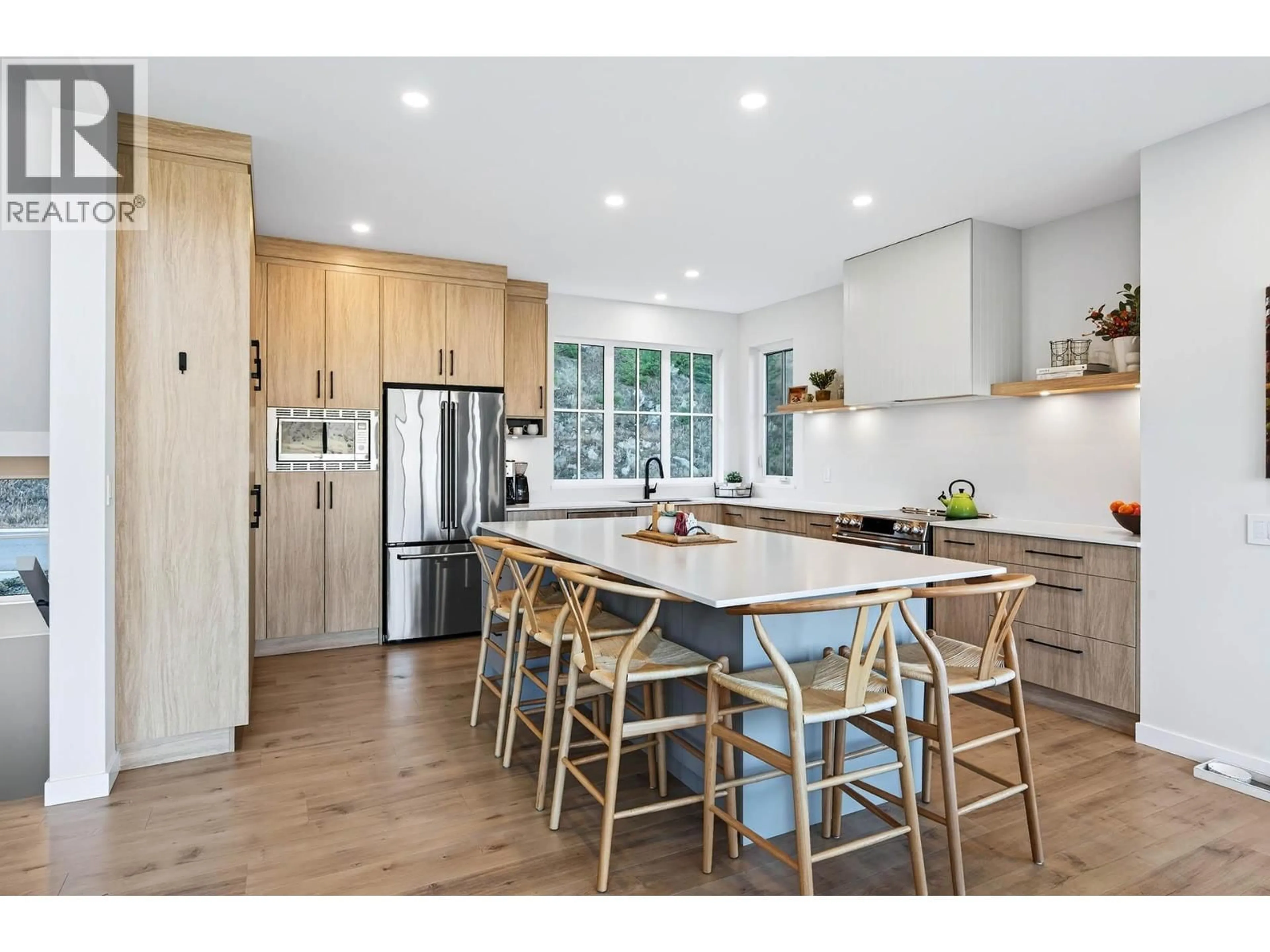 Open concept kitchen, wood/laminate floor for 31 - 3100 KICKING HORSE DRIVE, Kamloops British Columbia V2E0B8