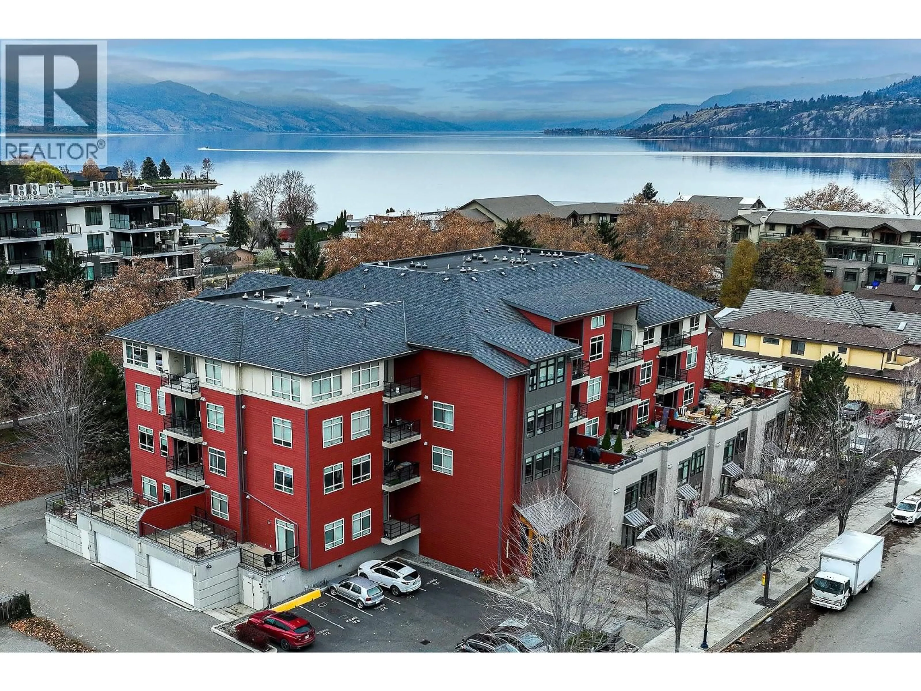 A pic from outside/outdoor area/front of a property/back of a property/a pic from drone, mountain view for 303 - 457 WEST AVENUE, Kelowna British Columbia V1Y4Z3