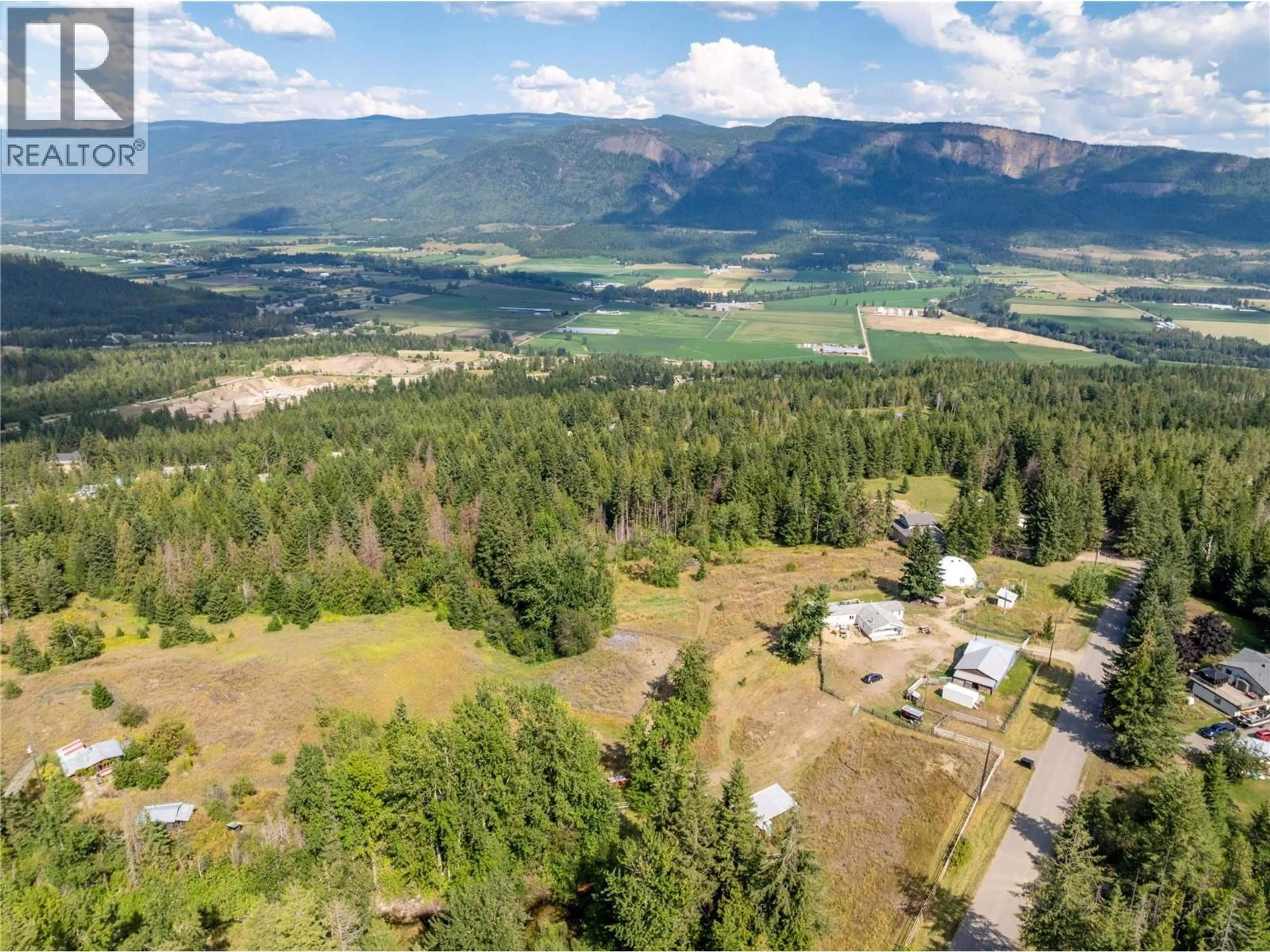 A pic from outside/outdoor area/front of a property/back of a property/a pic from drone, mountain view for 397 GLENMARY ROAD, Enderby British Columbia V0E1V3