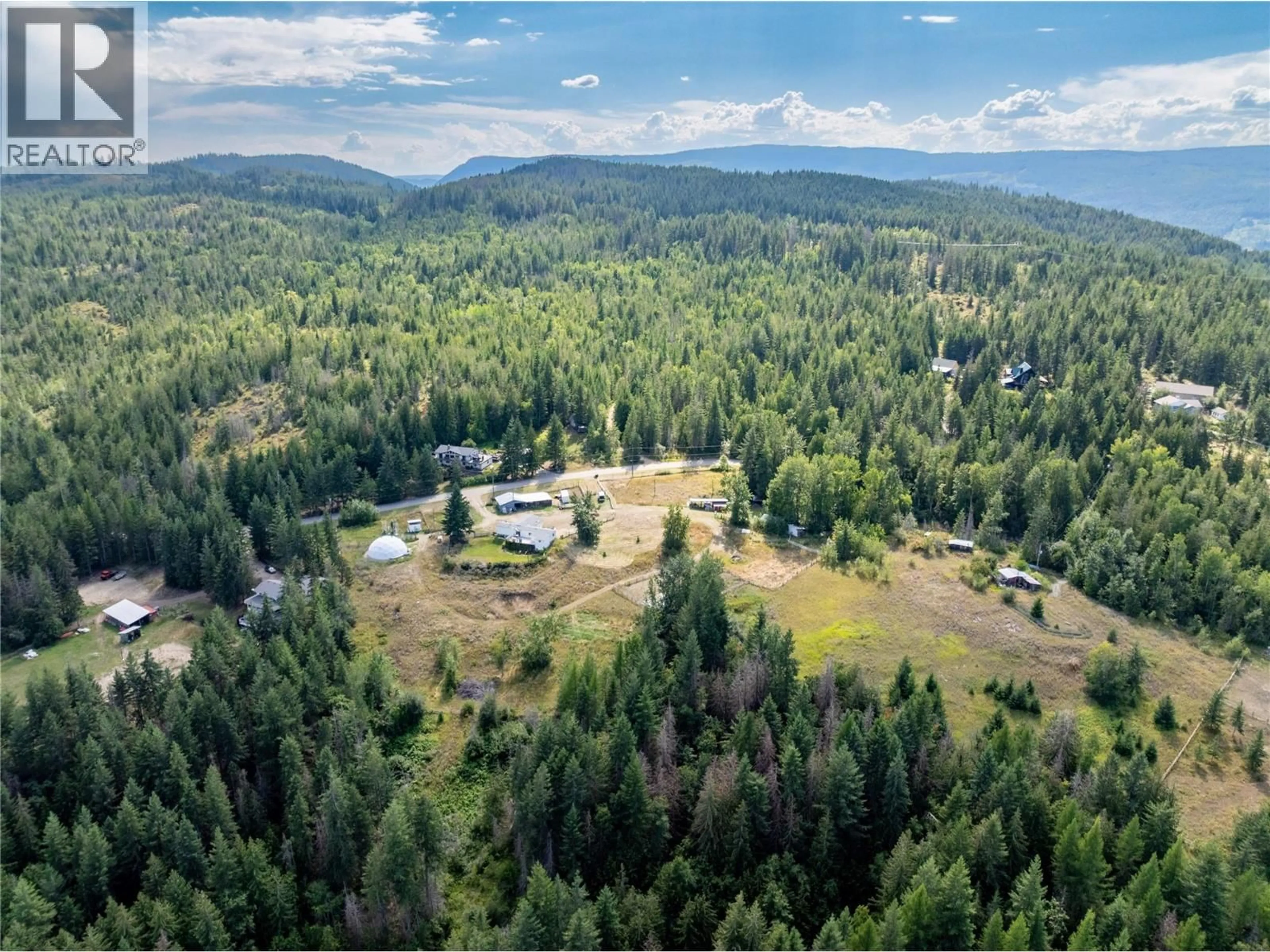 A pic from outside/outdoor area/front of a property/back of a property/a pic from drone, mountain view for 397 GLENMARY ROAD, Enderby British Columbia V0E1V3