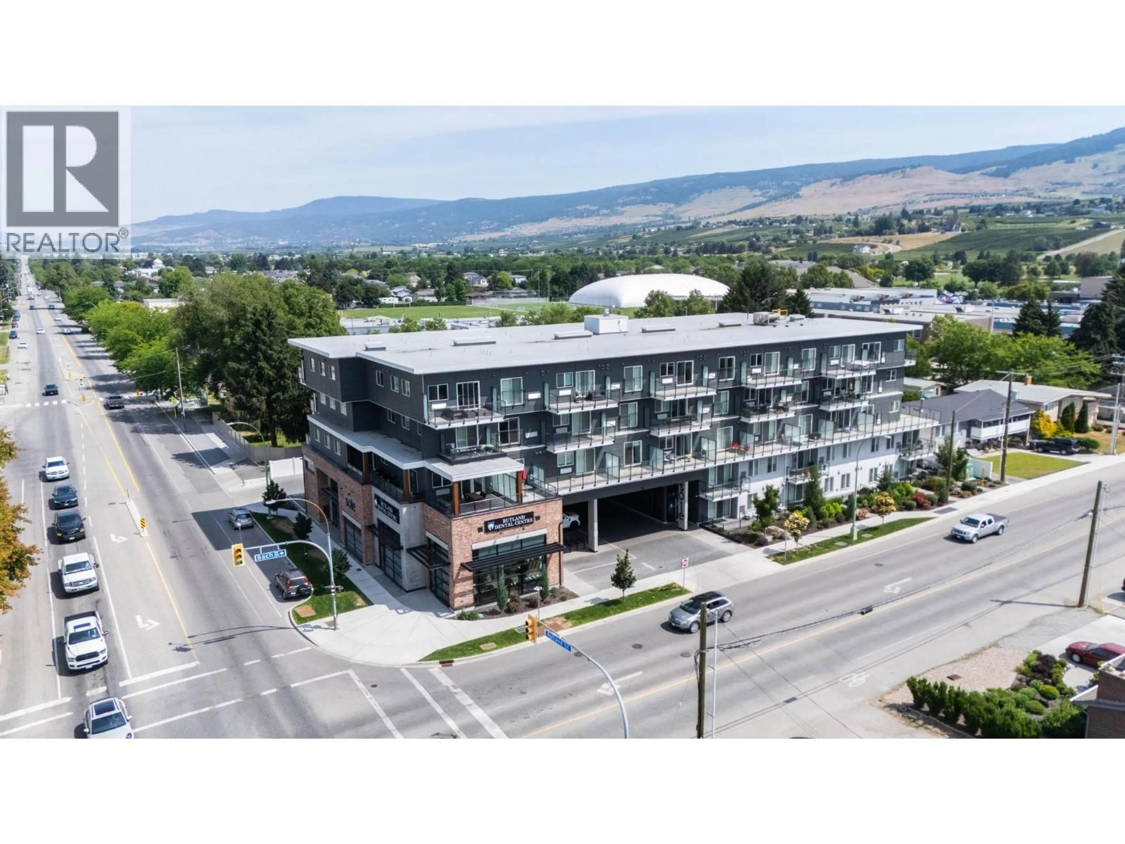 A pic from outside/outdoor area/front of a property/back of a property/a pic from drone, mountain view for 203 - 615 RUTLAND ROAD, Kelowna British Columbia V1X0B3