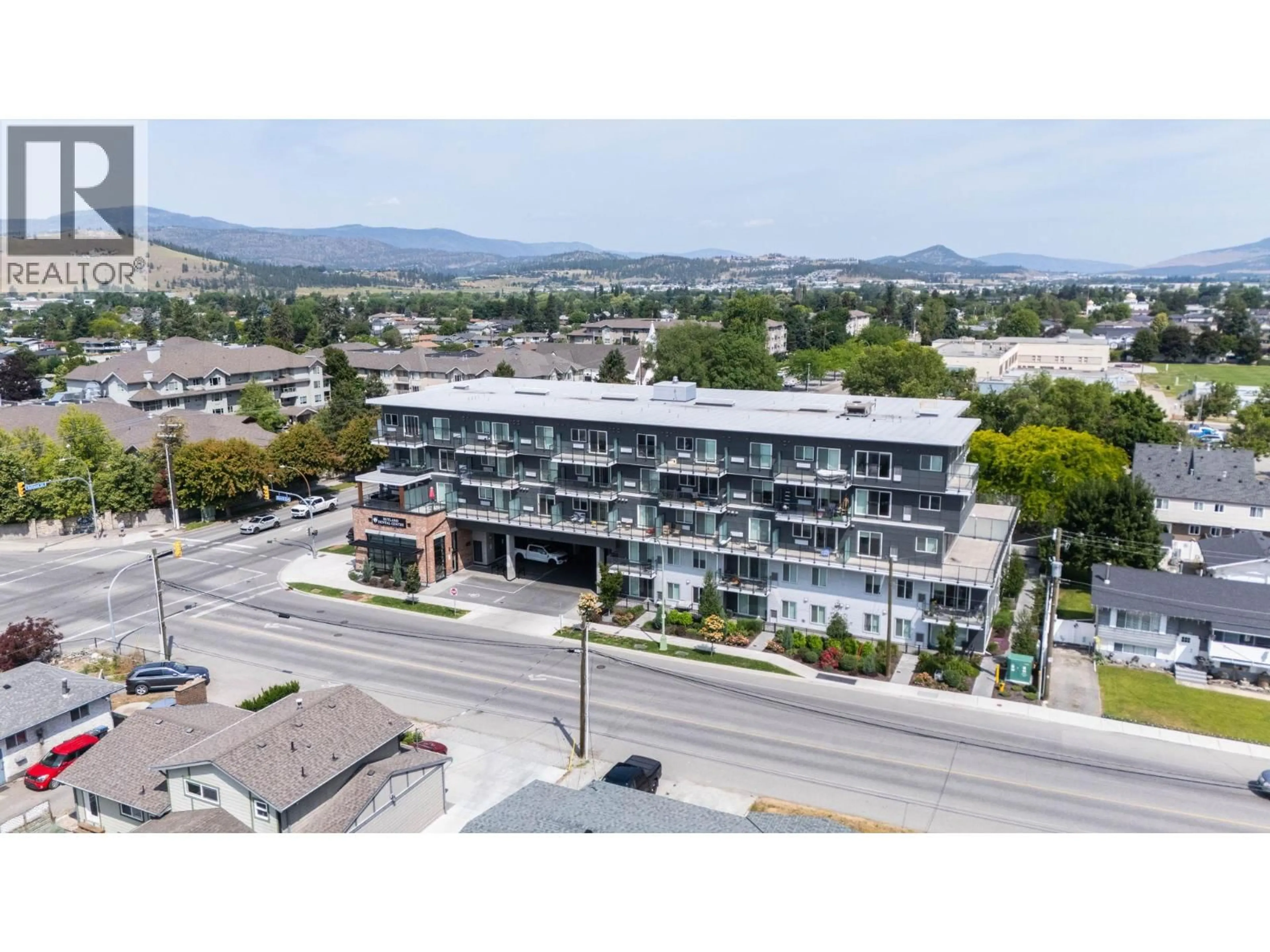 A pic from outside/outdoor area/front of a property/back of a property/a pic from drone, mountain view for 203 - 615 RUTLAND ROAD, Kelowna British Columbia V1X0B3