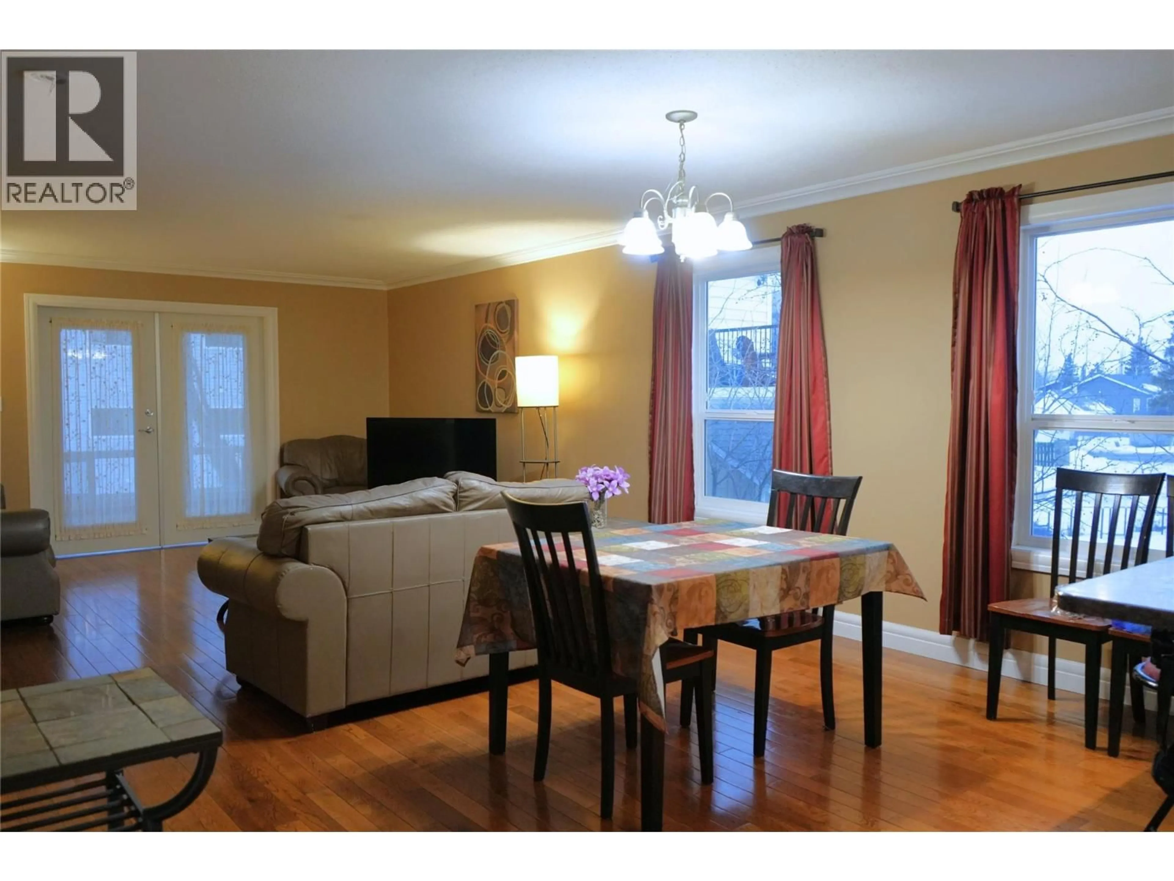 Dining room, wood/laminate floor for 219 100 AVENUE, Dawson Creek British Columbia V1G1V3