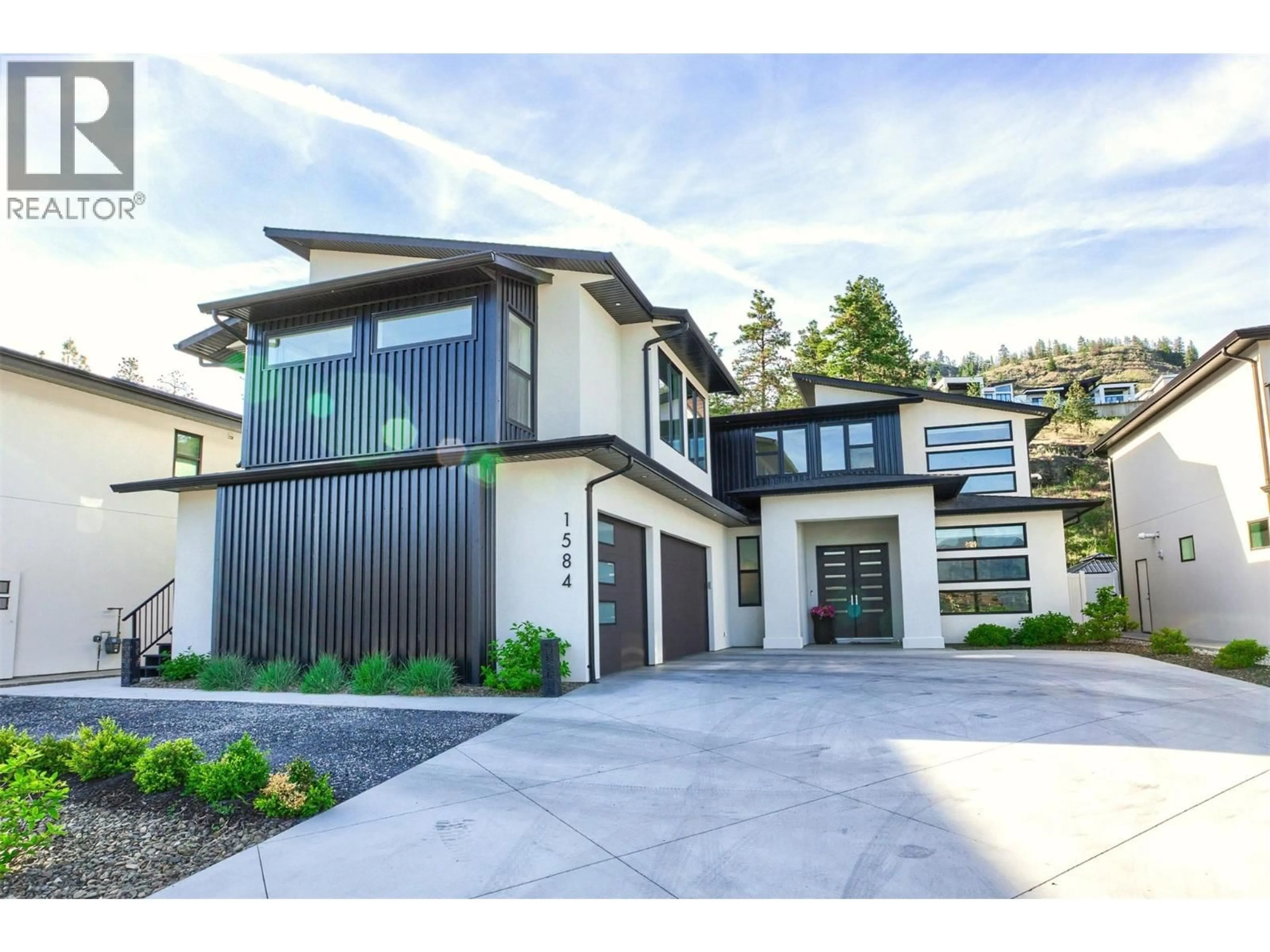 Home with brick exterior material, street for 1584 MALBEC PLACE, West Kelowna British Columbia V4T3B5