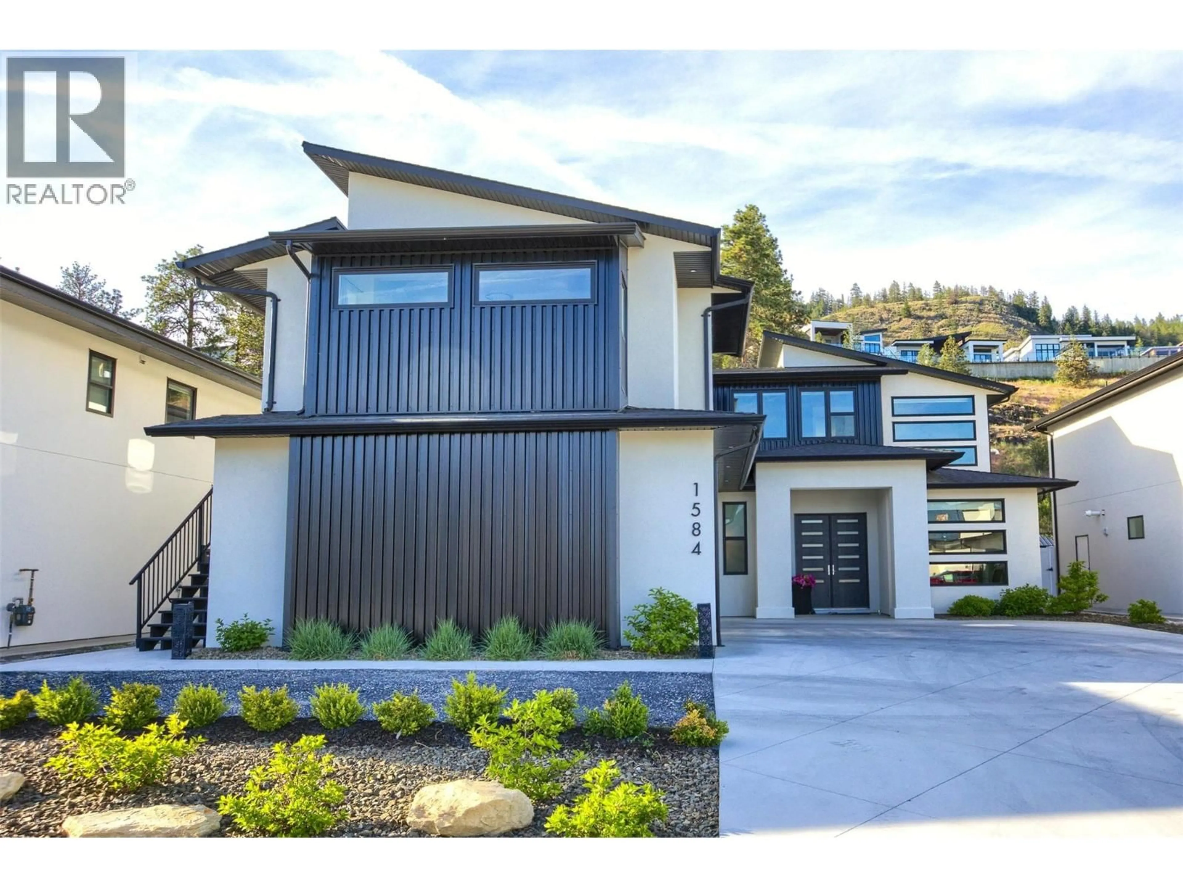 Home with vinyl exterior material, street for 1584 MALBEC PLACE, West Kelowna British Columbia V4T3B5