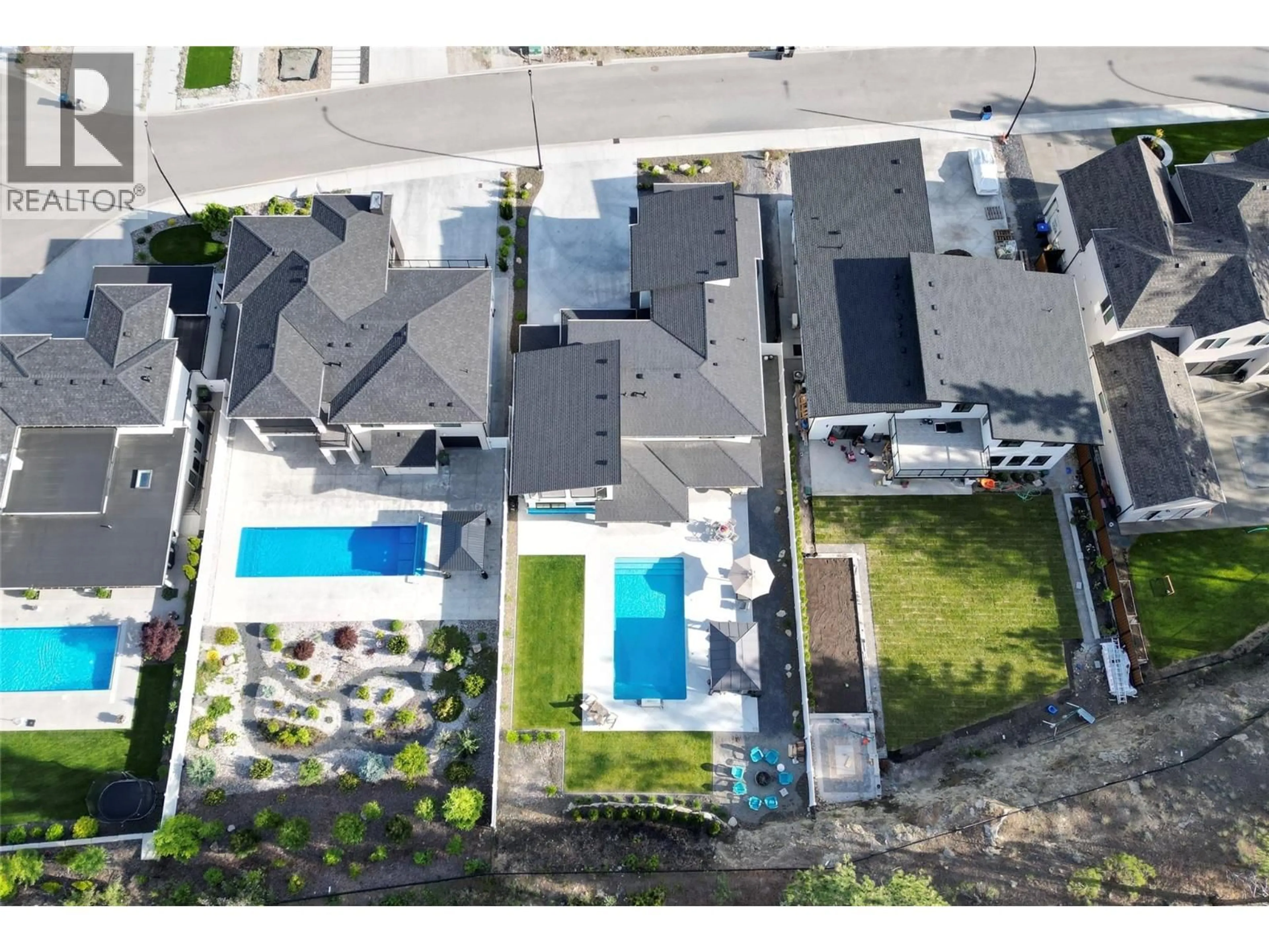 A pic from outside/outdoor area/front of a property/back of a property/a pic from drone, street for 1584 MALBEC PLACE, West Kelowna British Columbia V4T3B5