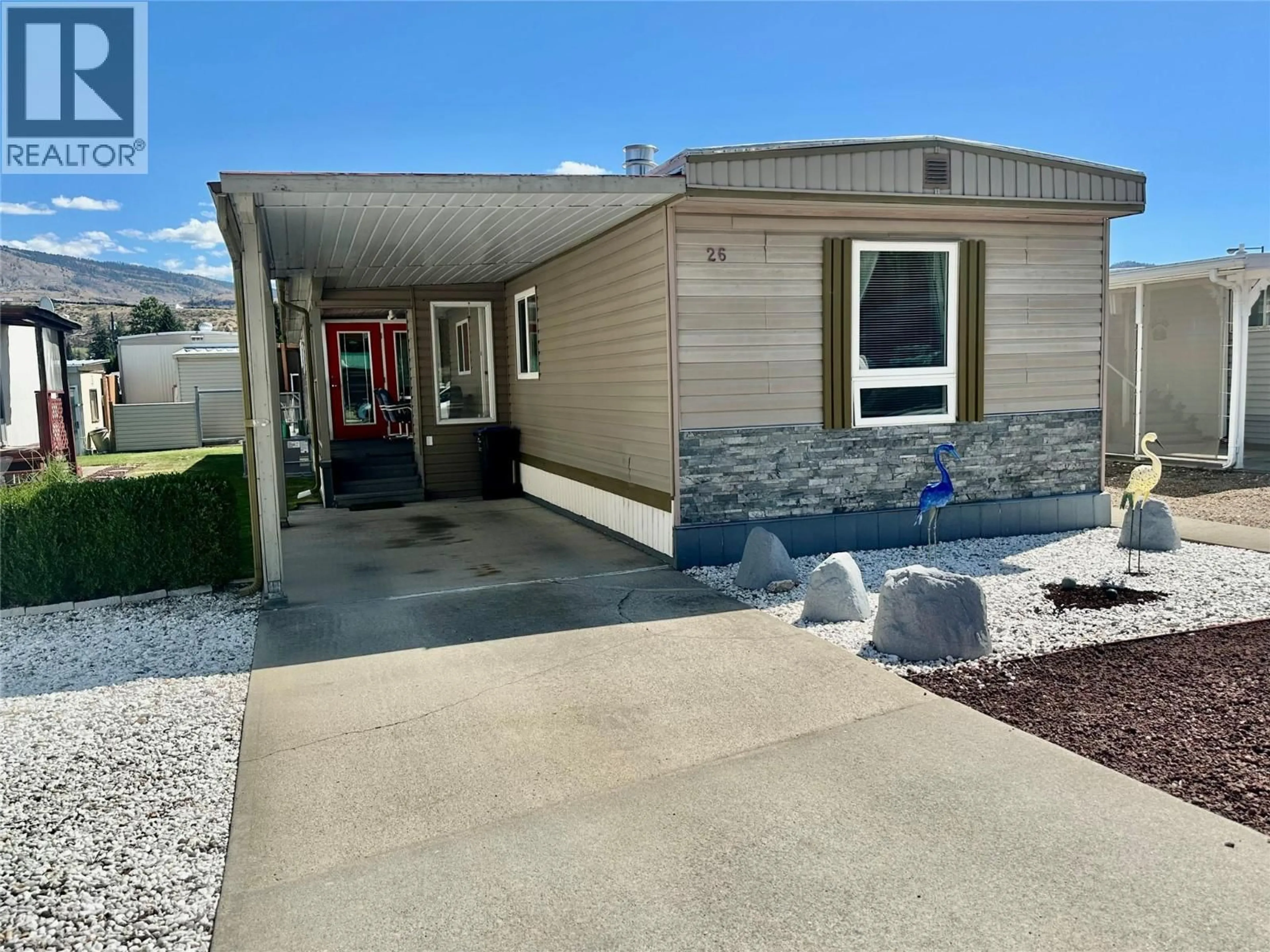 Home with vinyl exterior material, street for 26 - 6778 TUCELNUIT DRIVE, Oliver British Columbia V0H1T3