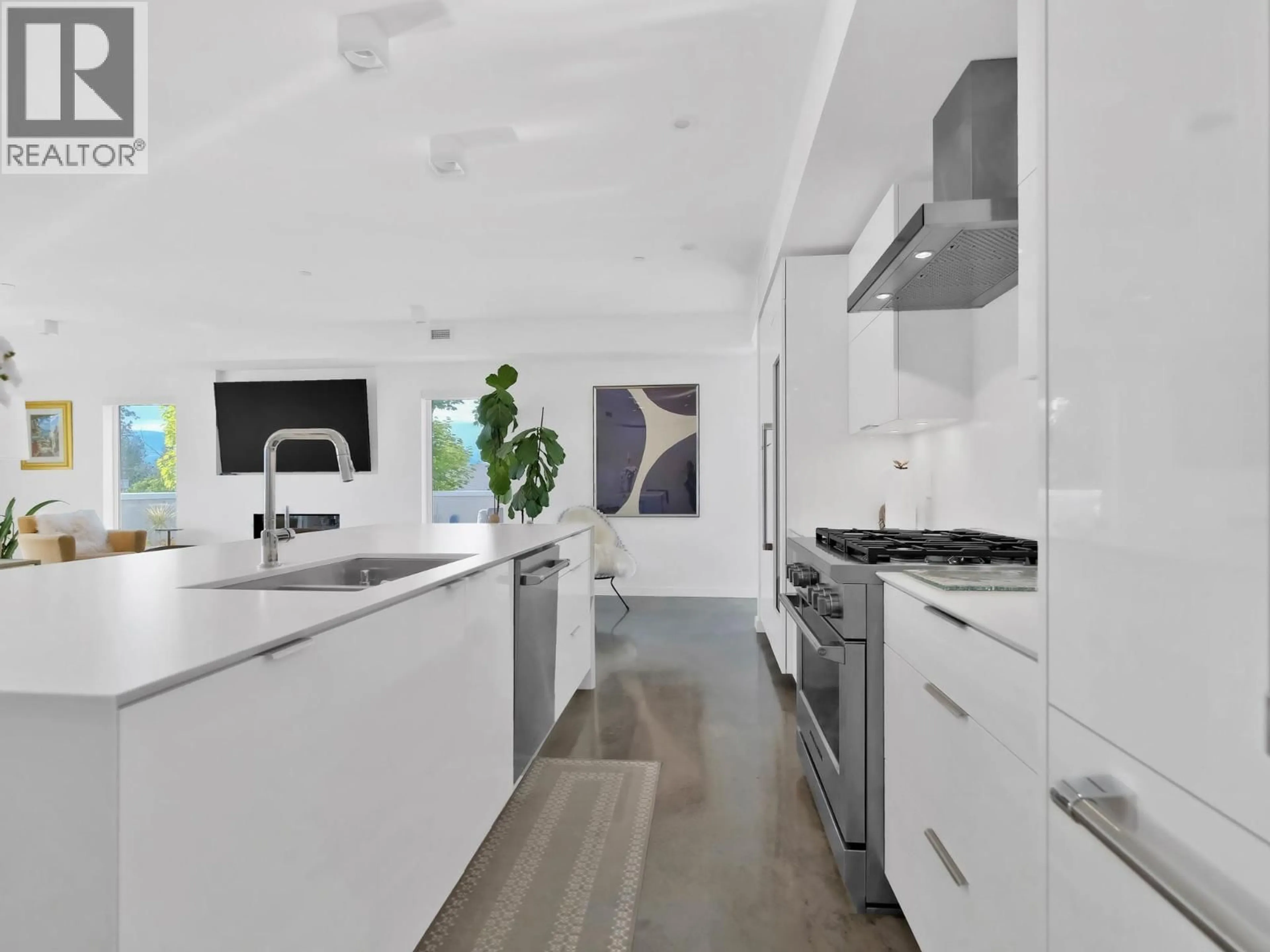 Contemporary kitchen, ceramic/tile floor for 201 - 4071 LAKESHORE ROAD, Kelowna British Columbia V1W1V7