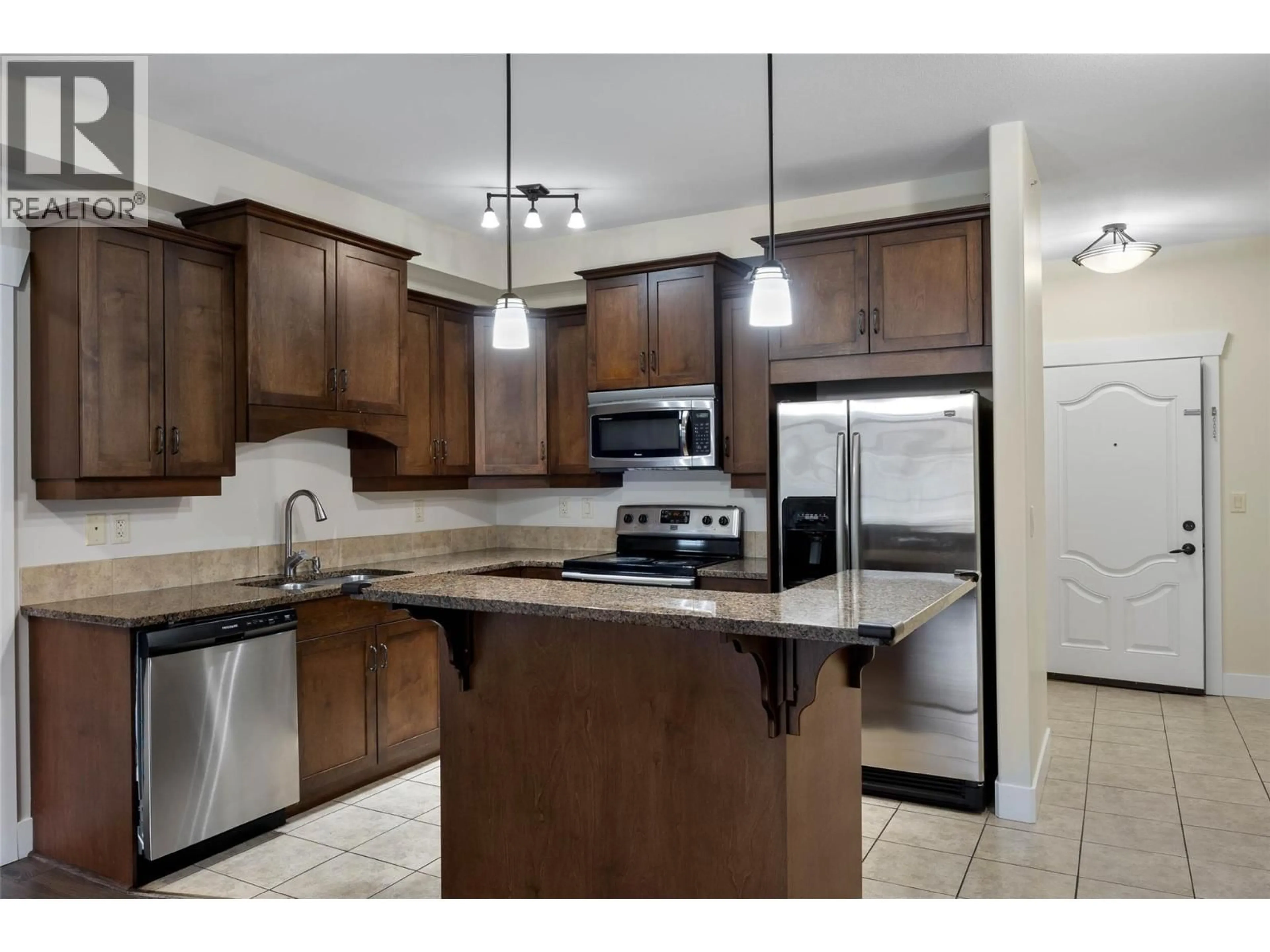 Open concept kitchen, ceramic/tile floor for 412 - 795 MCGILL ROAD, Kamloops British Columbia V2C0B9