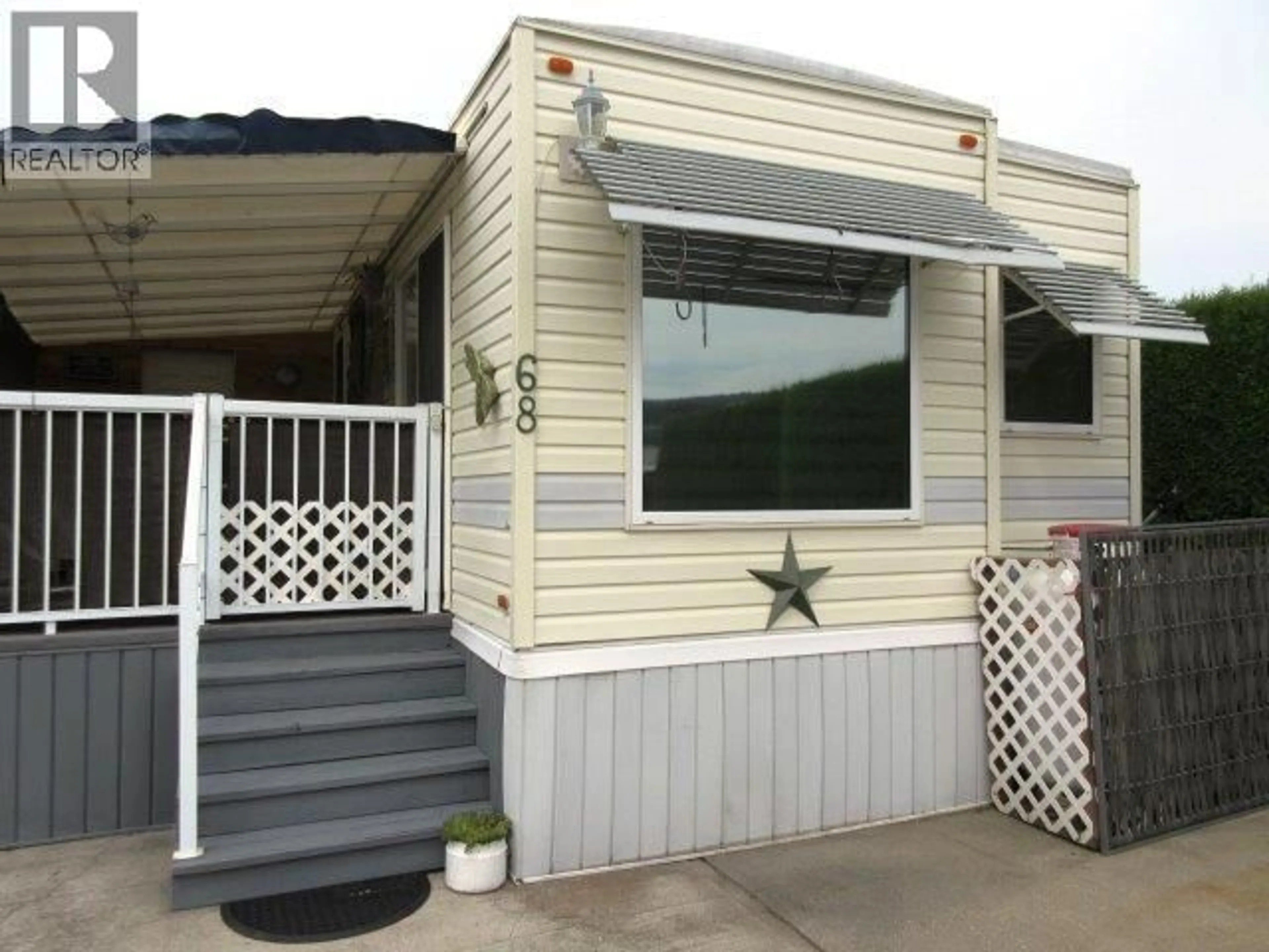 Home with vinyl exterior material, street for 68 - 415 COMMONWEALTH ROAD, Kelowna British Columbia V4V1P4