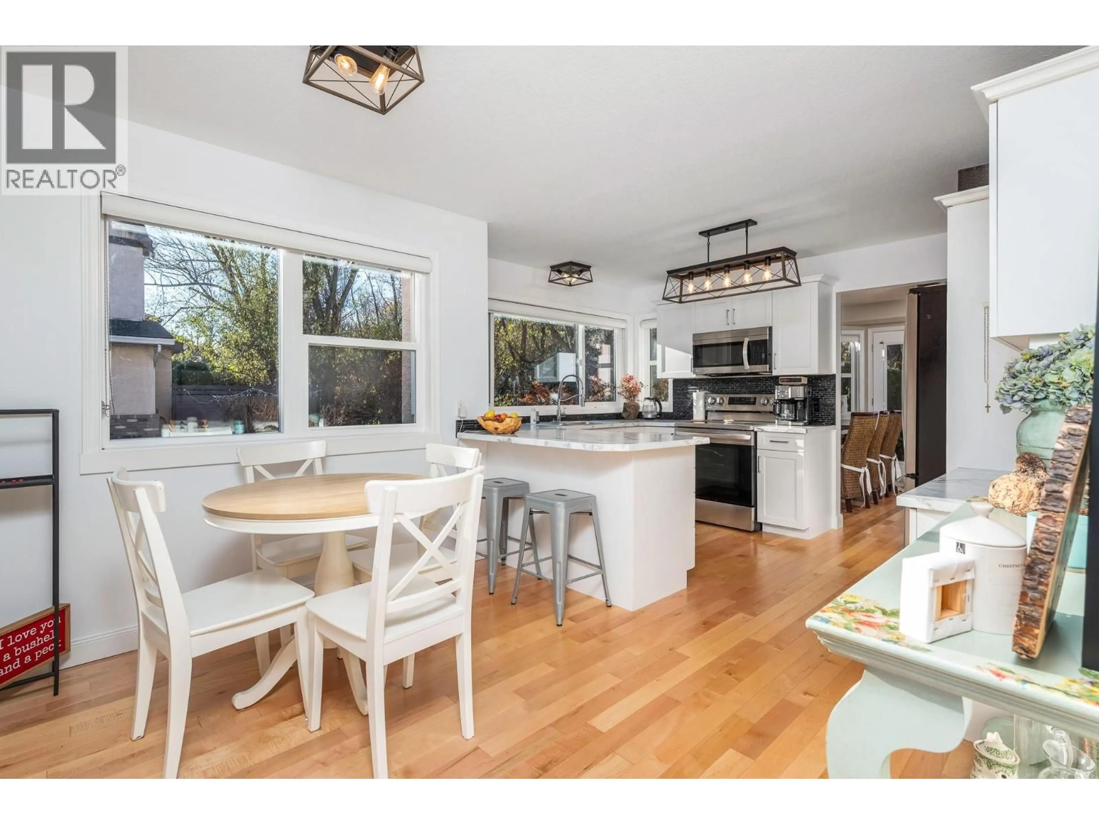 Open concept kitchen, wood/laminate floor for 9 - 401 BROWNE ROAD, Vernon British Columbia V1T7M2