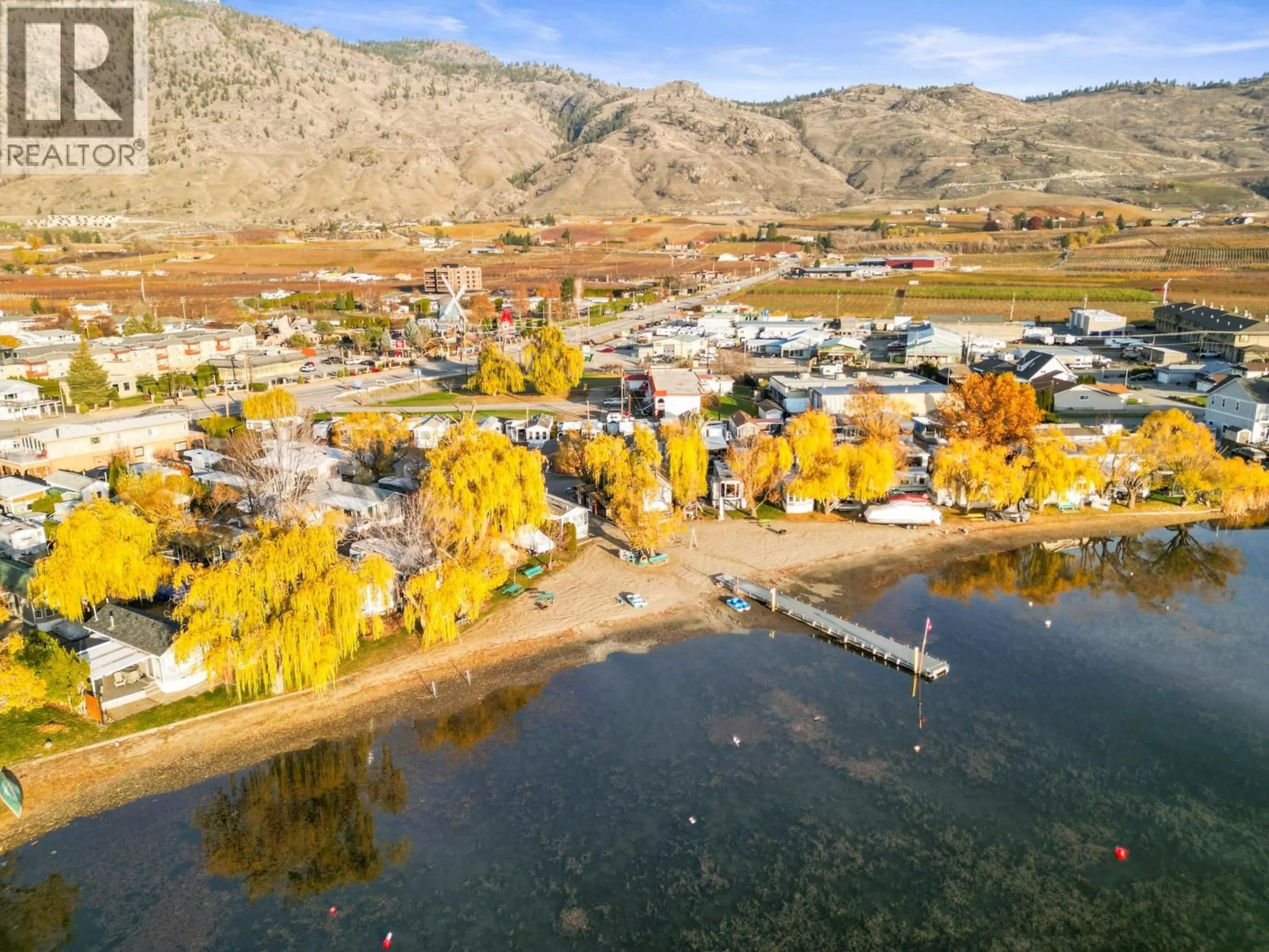A pic from outside/outdoor area/front of a property/back of a property/a pic from drone, water/lake/river/ocean view for 57 - 5901 MAIN STREET, Osoyoos British Columbia V0H1V3