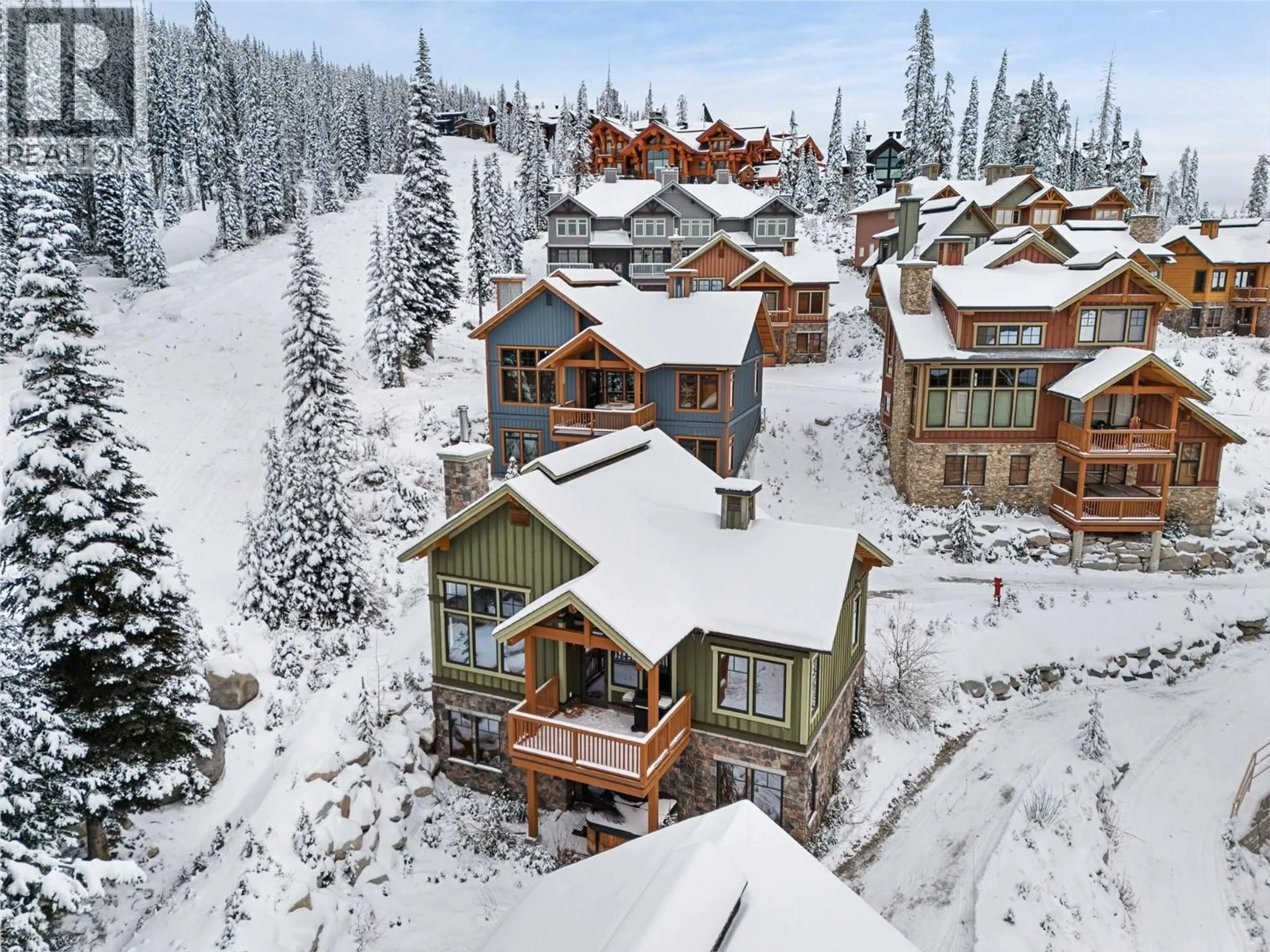 A pic from outside/outdoor area/front of a property/back of a property/a pic from drone, mountain view for 14 - 255 FEATHERTOP WAY, Big White British Columbia V1P1T4