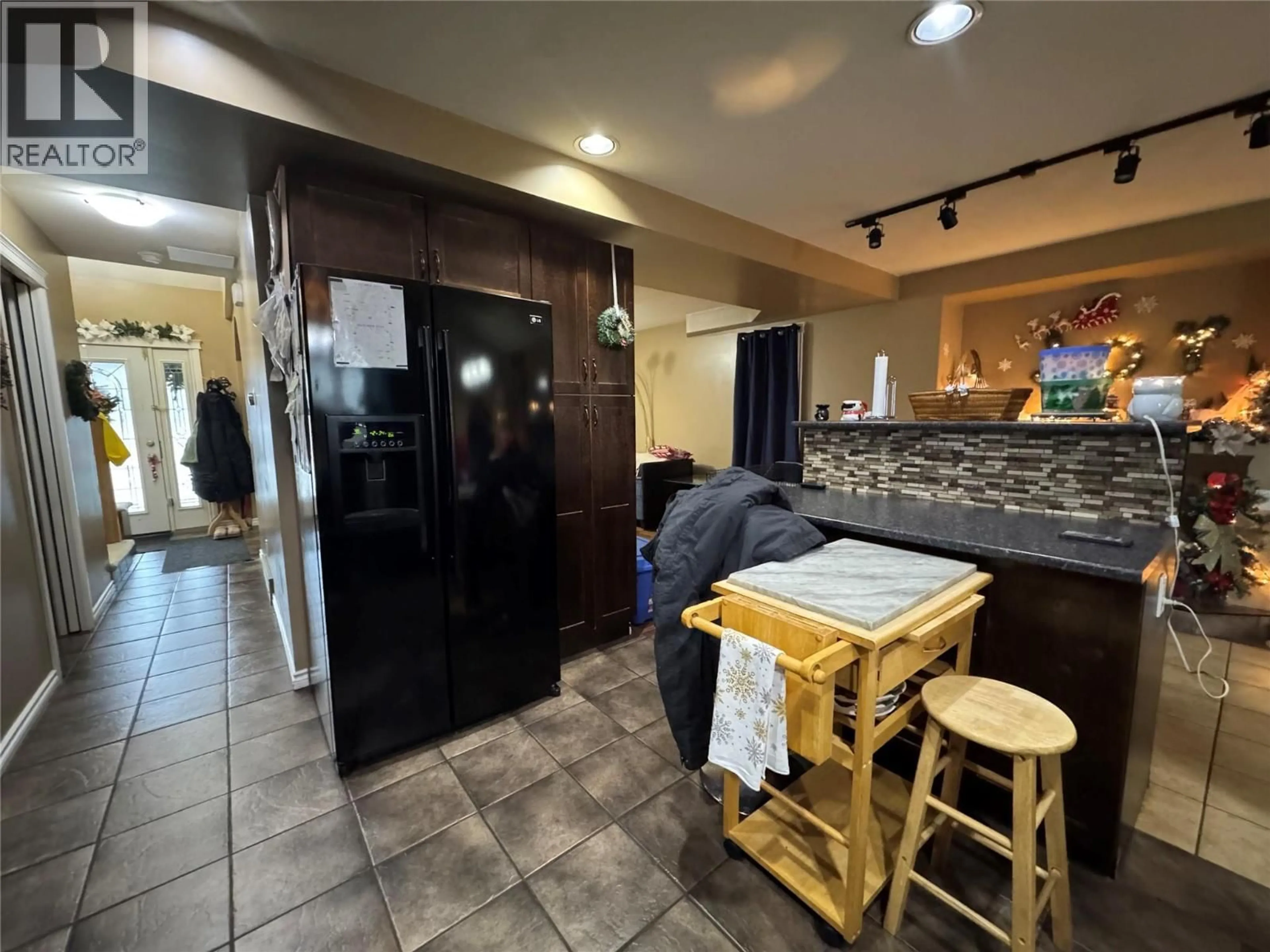 Open concept kitchen, ceramic/tile floor for 1837 109 AVENUE, Dawson Creek British Columbia V1G2V6