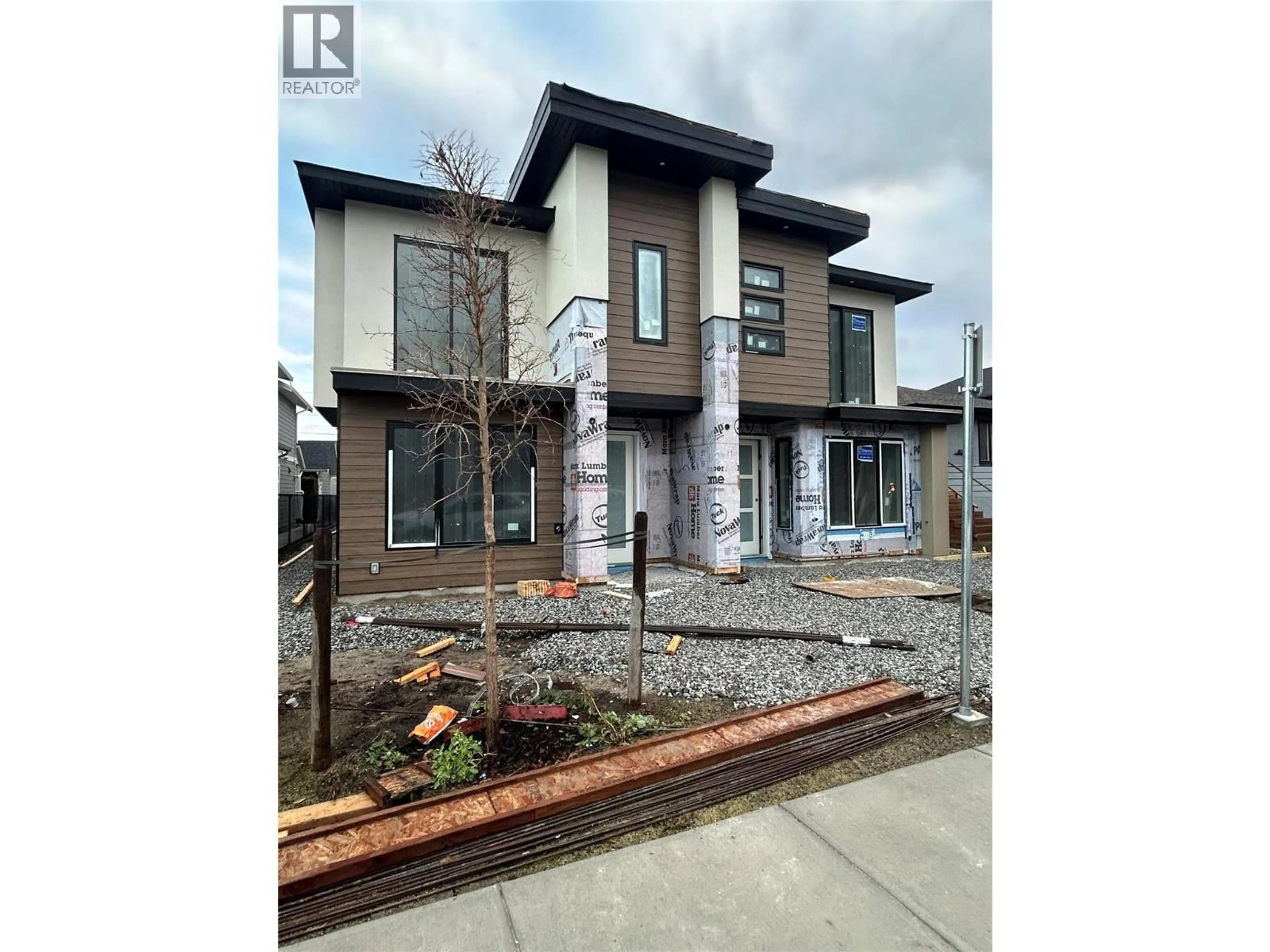Home with brick exterior material, street for 2 - 796 GLENWOOD AVENUE, Kelowna British Columbia V1Y5M5