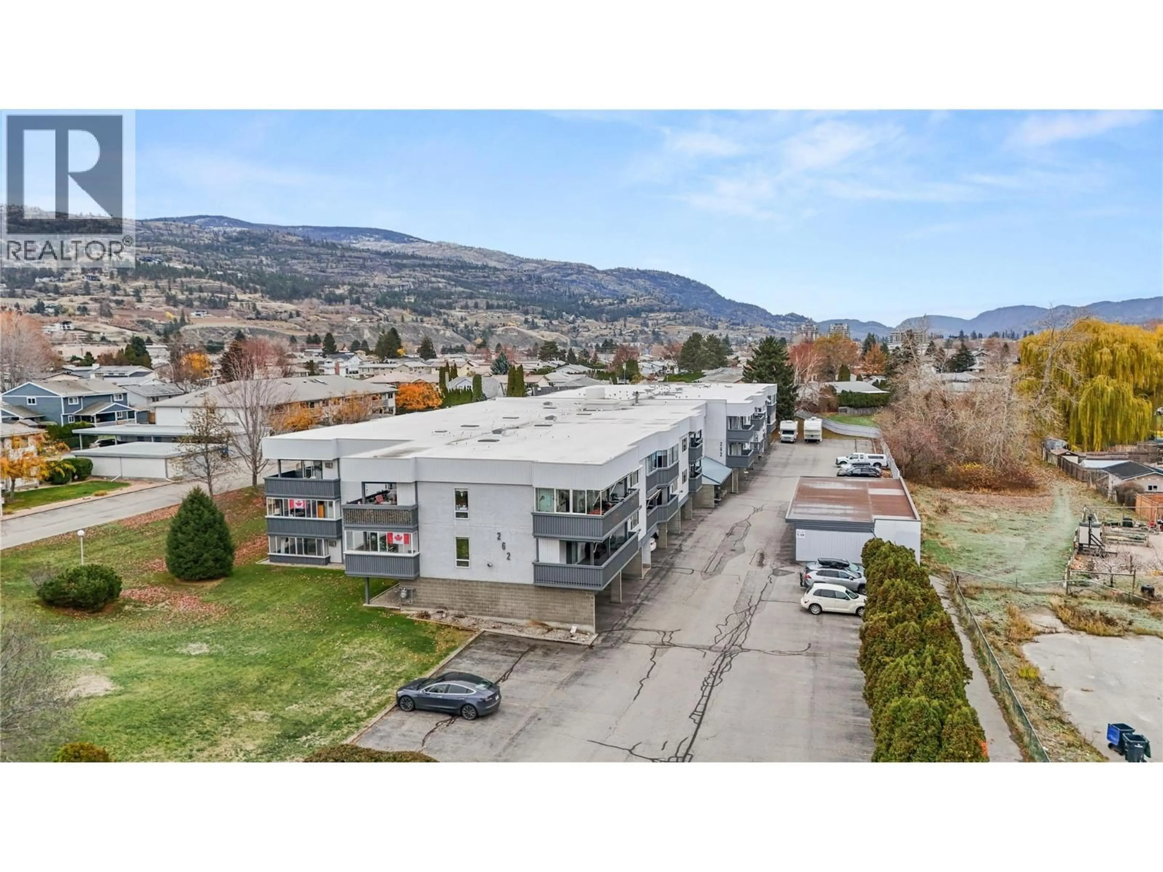 A pic from outside/outdoor area/front of a property/back of a property/a pic from drone, mountain view for 311 - 262 KINNEY AVENUE, Penticton British Columbia V2A6R6